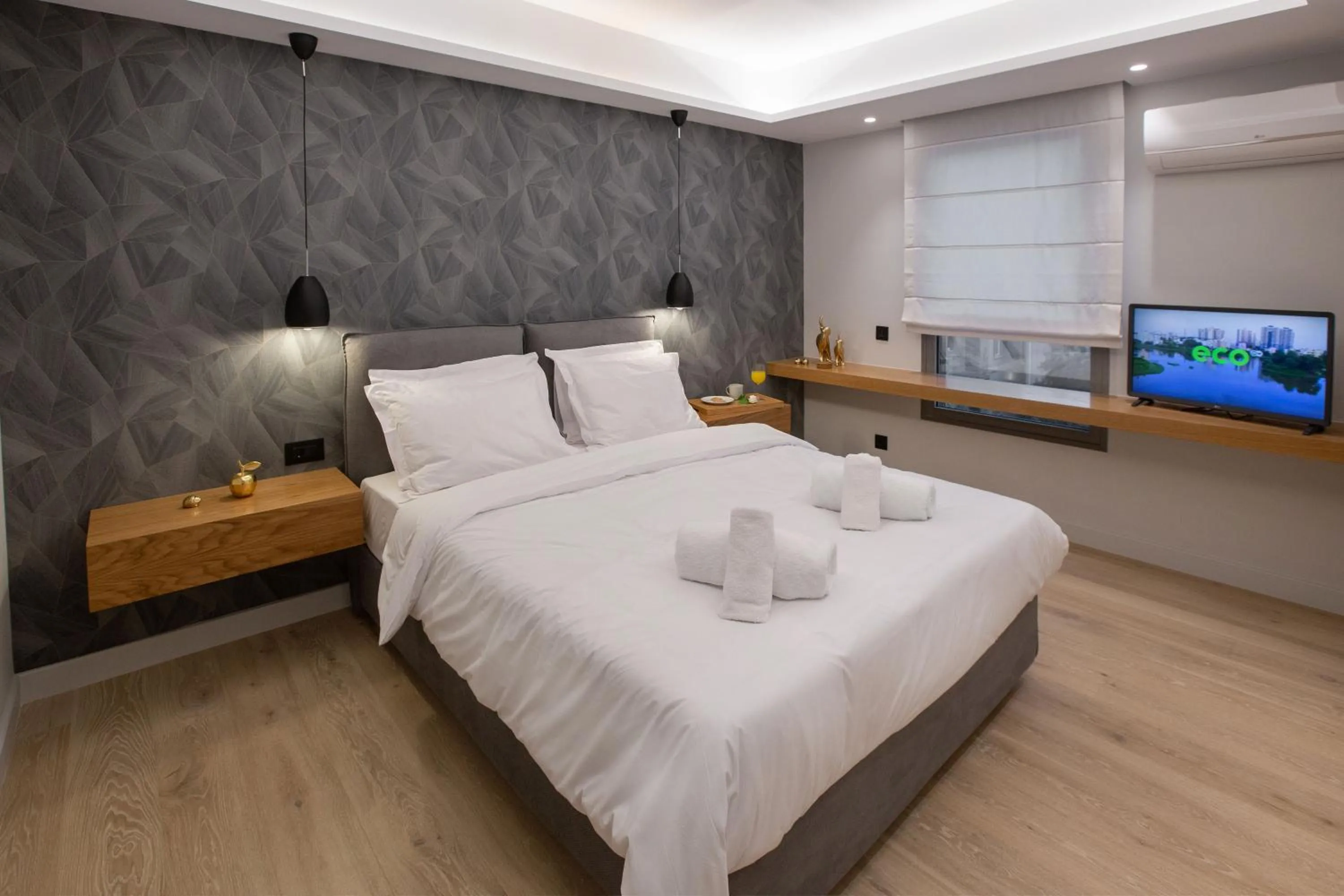 Bed in Acropolis Golden Suites by GHH