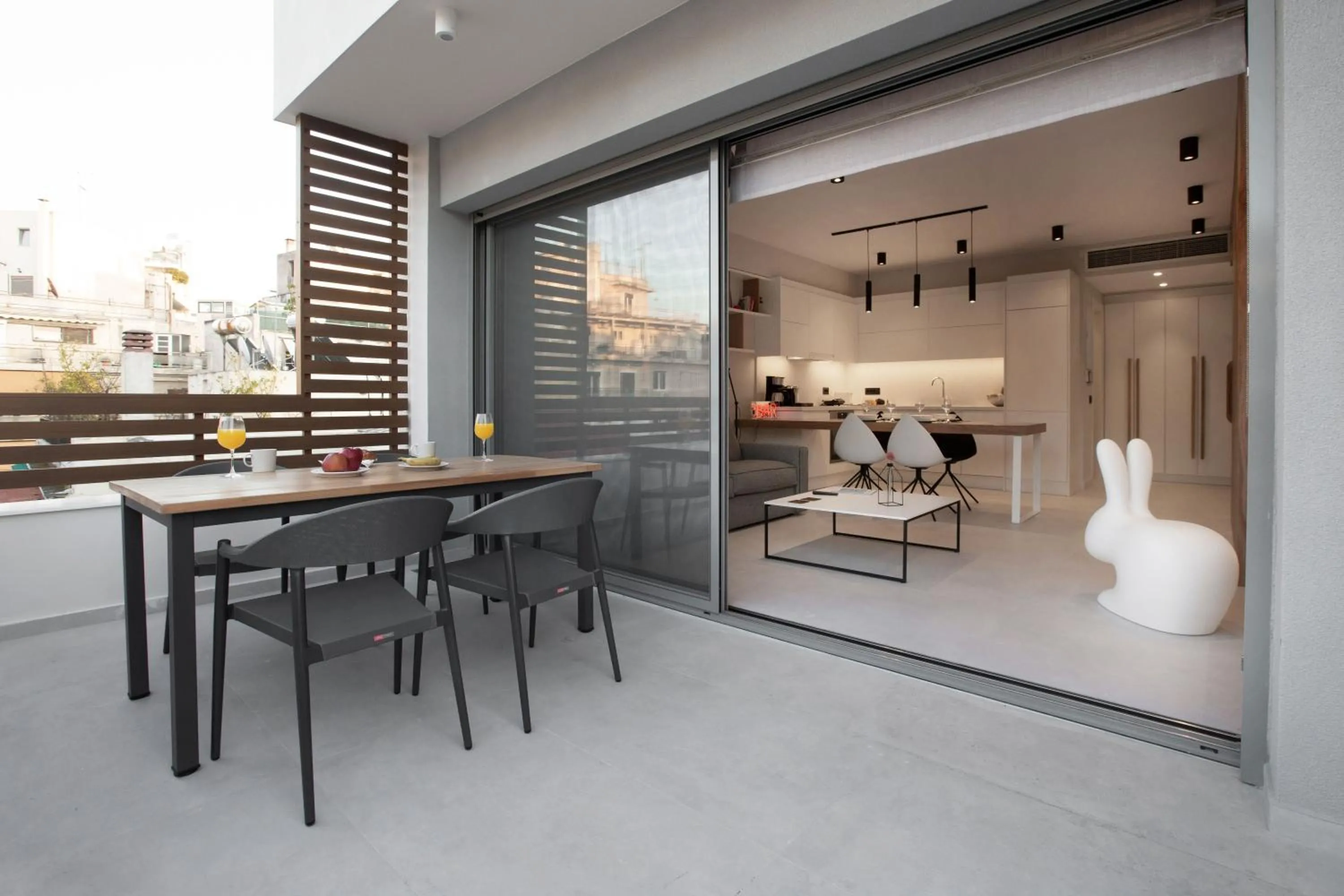 Dining area in Acropolis Golden Suites by GHH