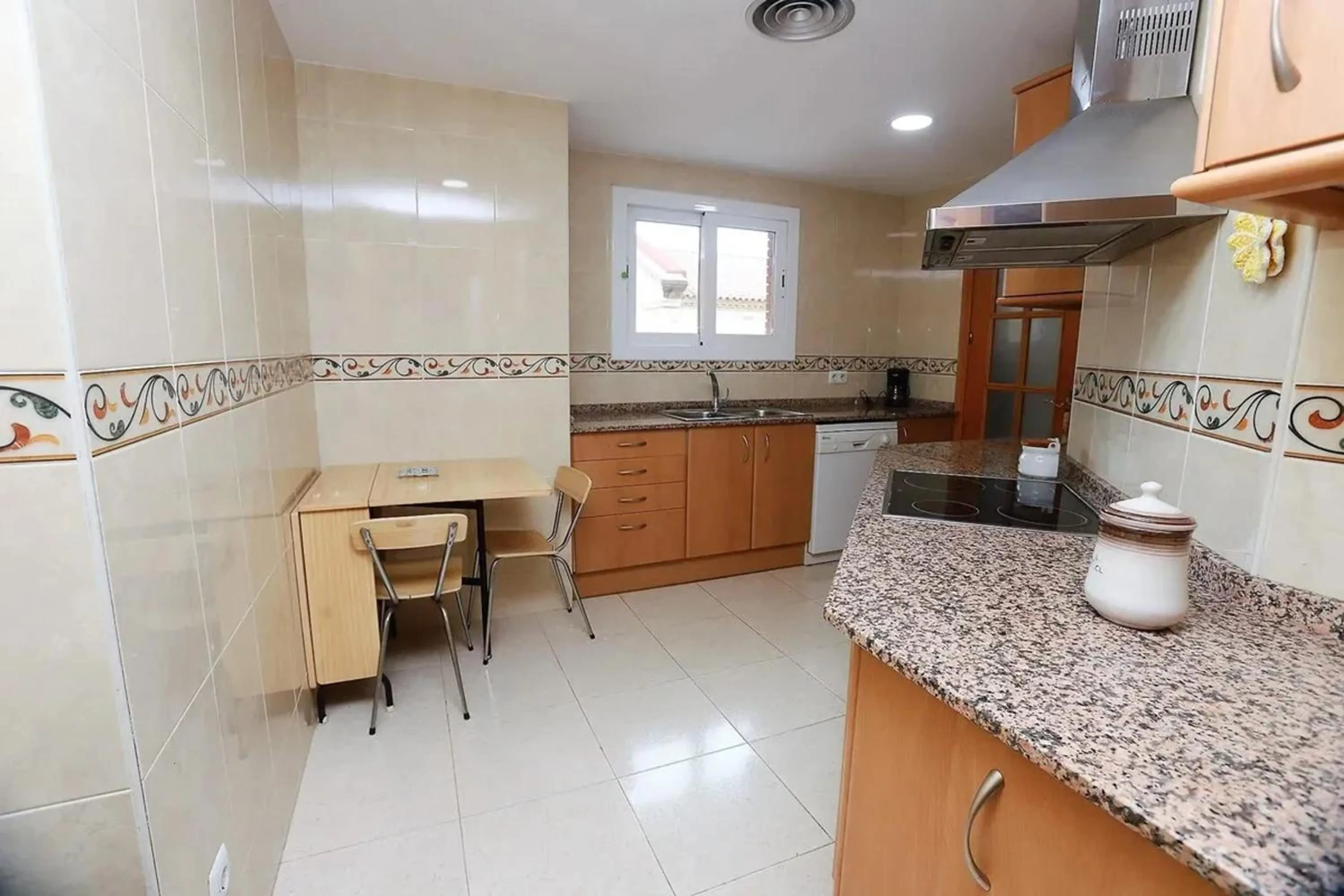 Kitchen or kitchenette in Modern apartment in Calafell with sea and mountain view