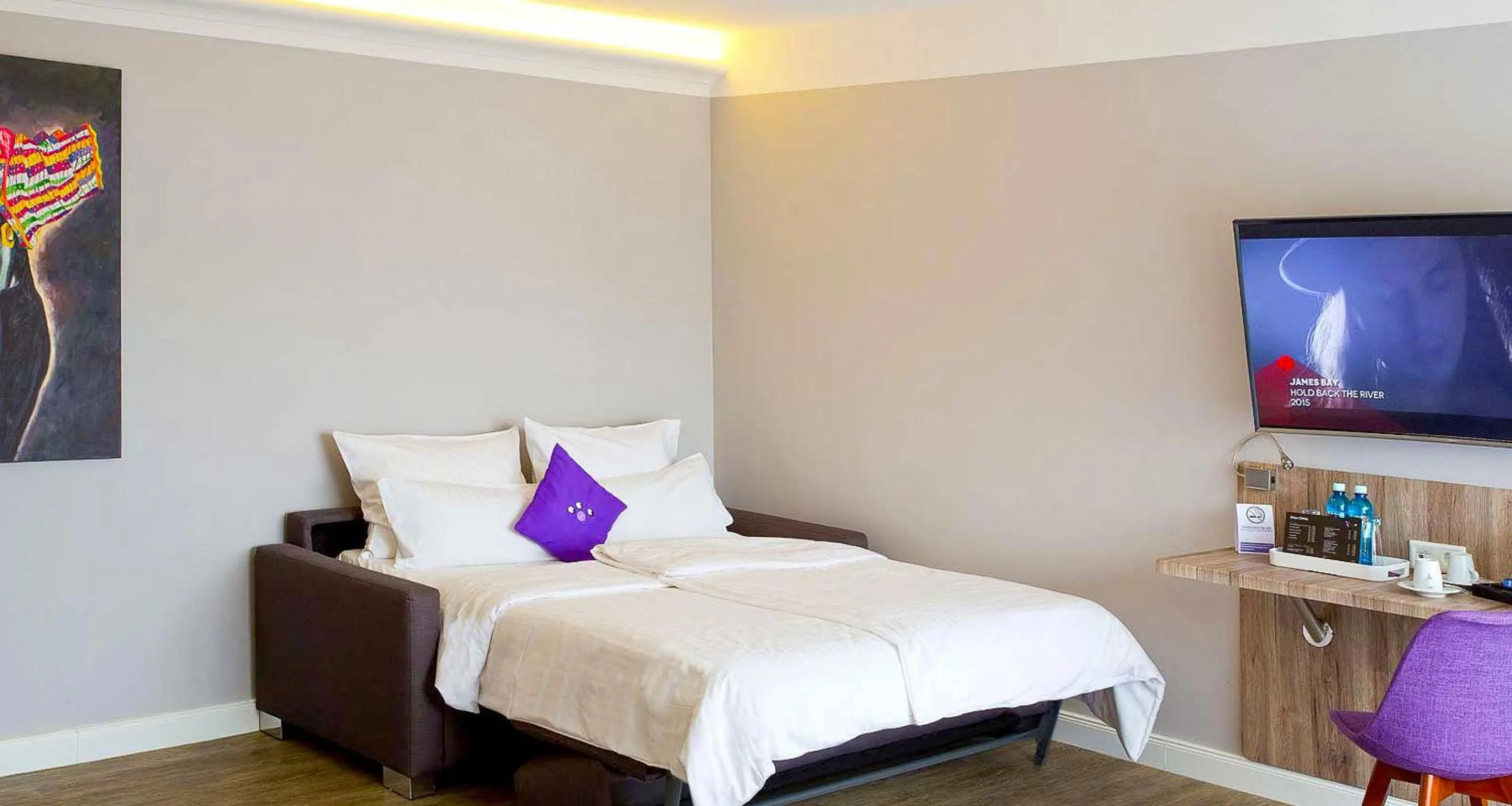 Bed in PLAZA INN stays design Dortmund