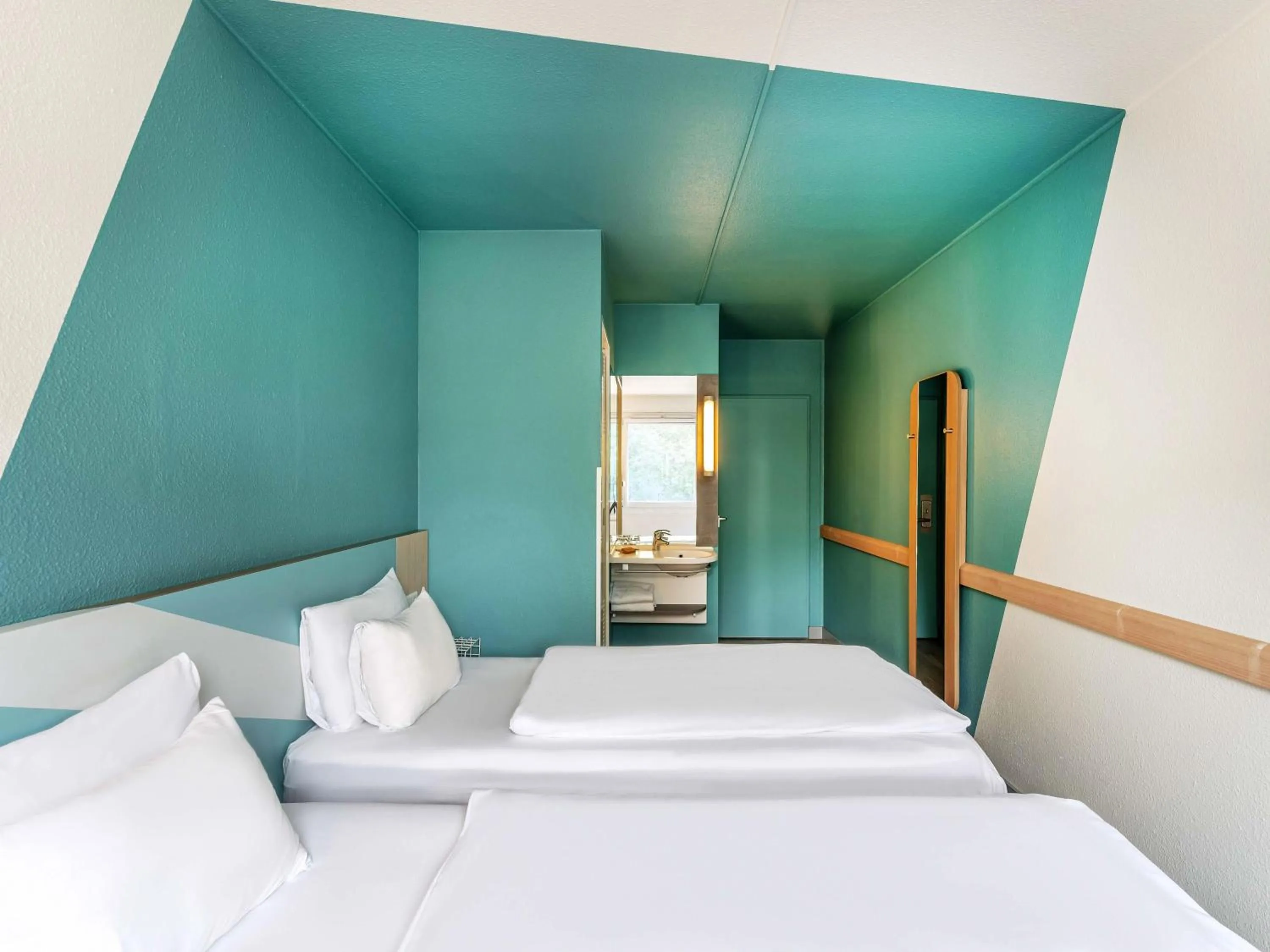 Photo of the whole room, Bed in B&B HOTEL Freiburg-West