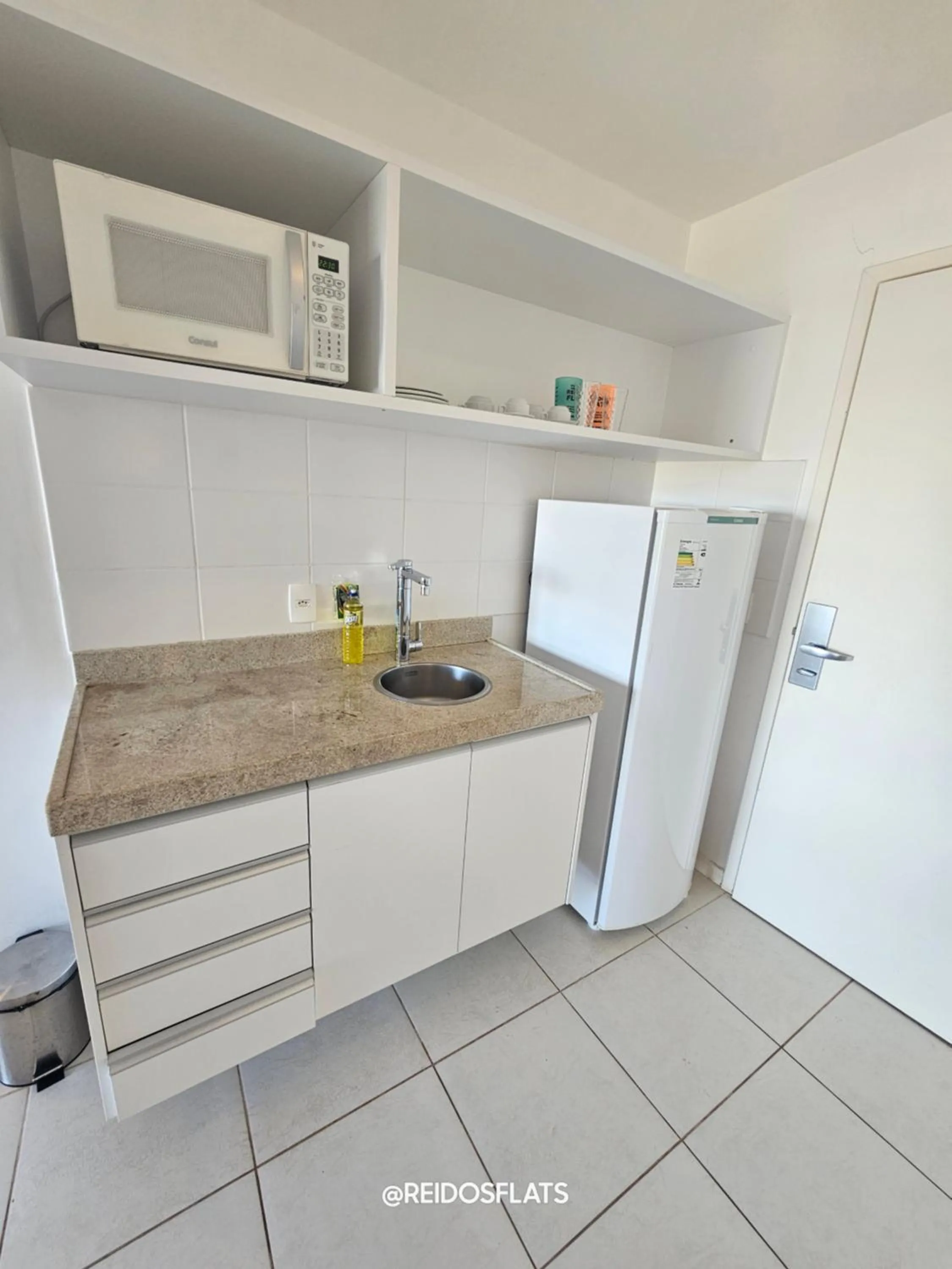 Kitchen or kitchenette in Flat Vision Executivo Premium By Rei dos Flats