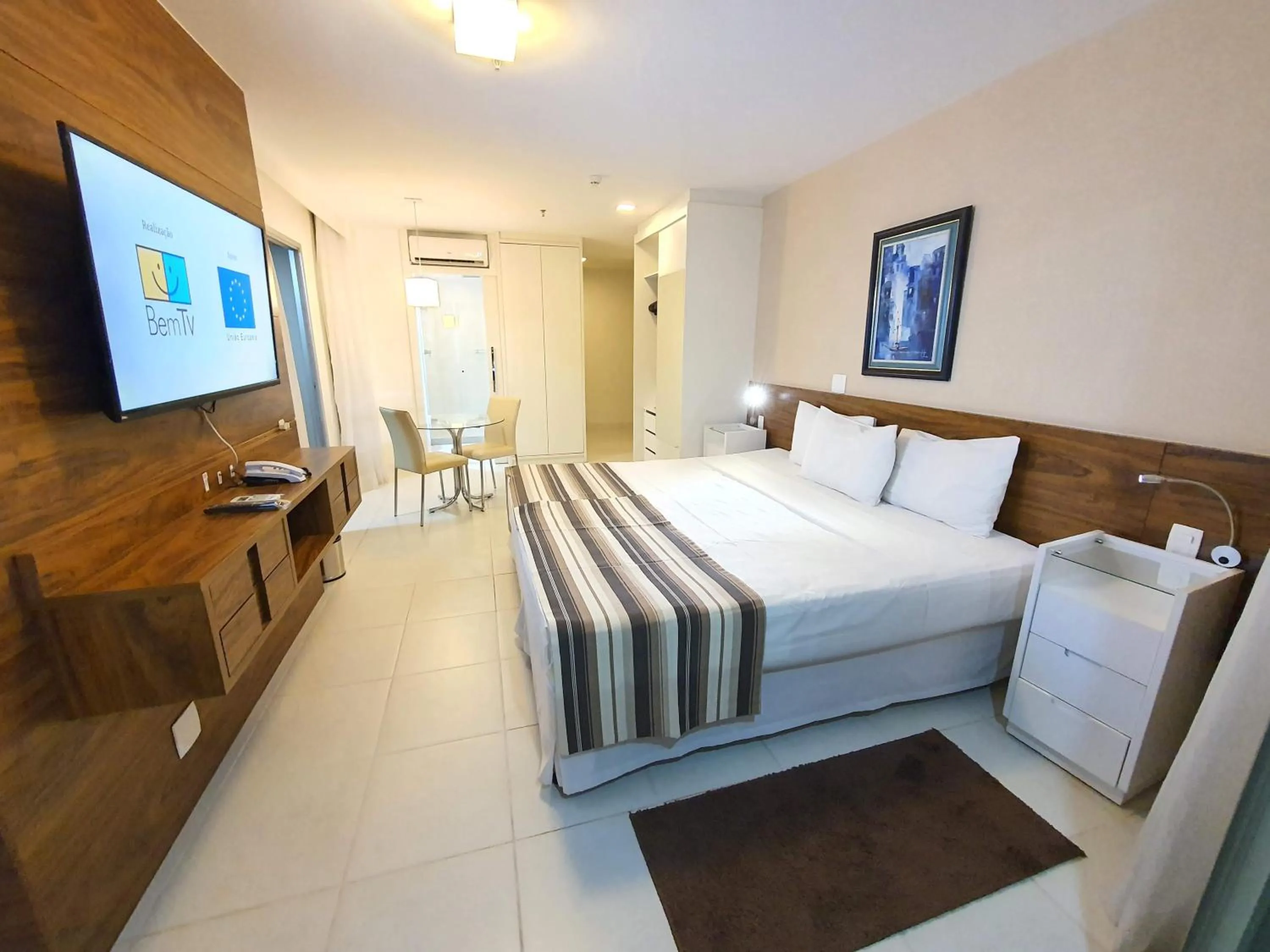 Communal lounge/ TV room, Bed in Flat Vision Executivo Premium By Rei dos Flats