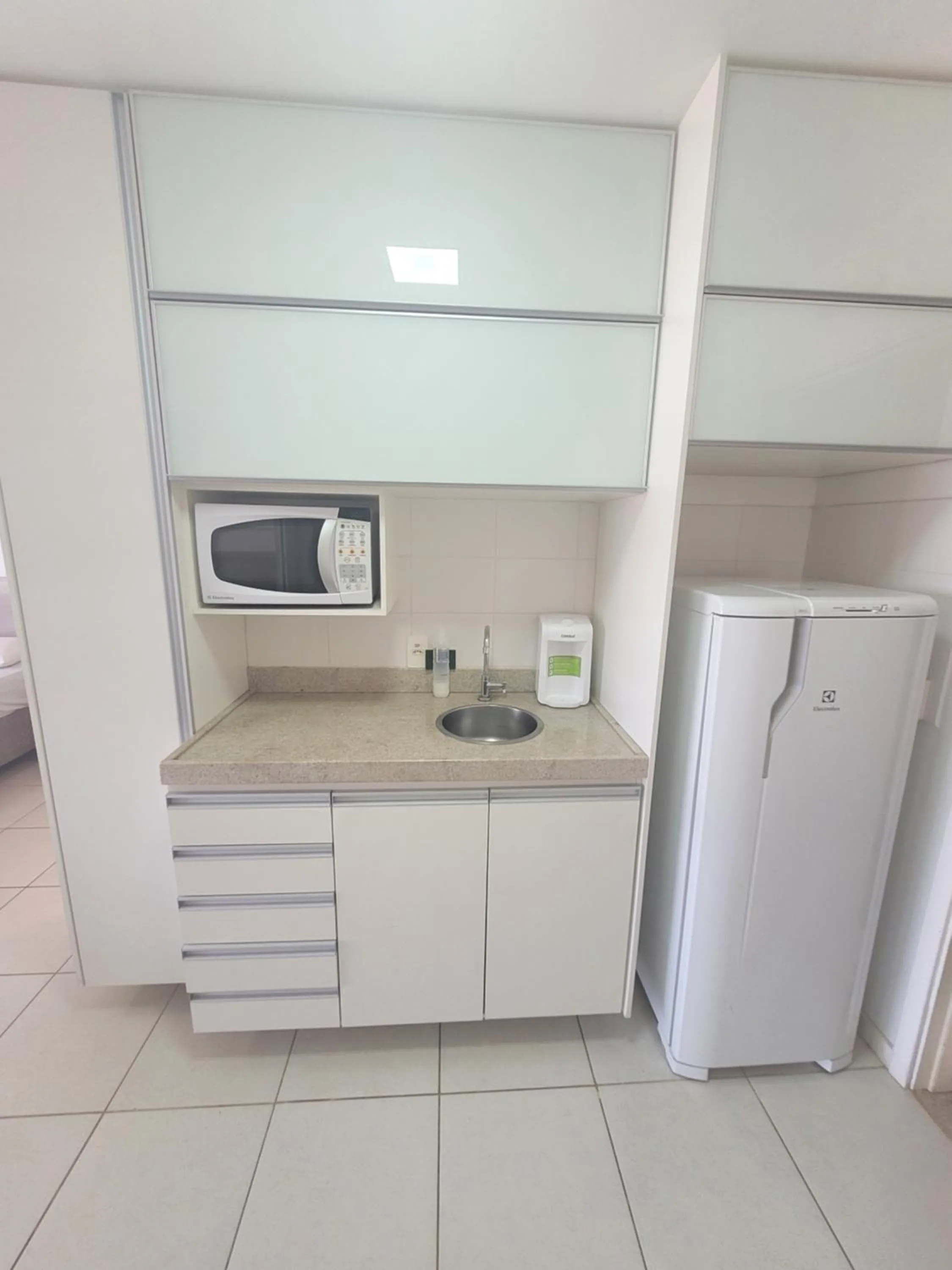 Kitchen or kitchenette in Flat Vision Executivo Premium By Rei dos Flats