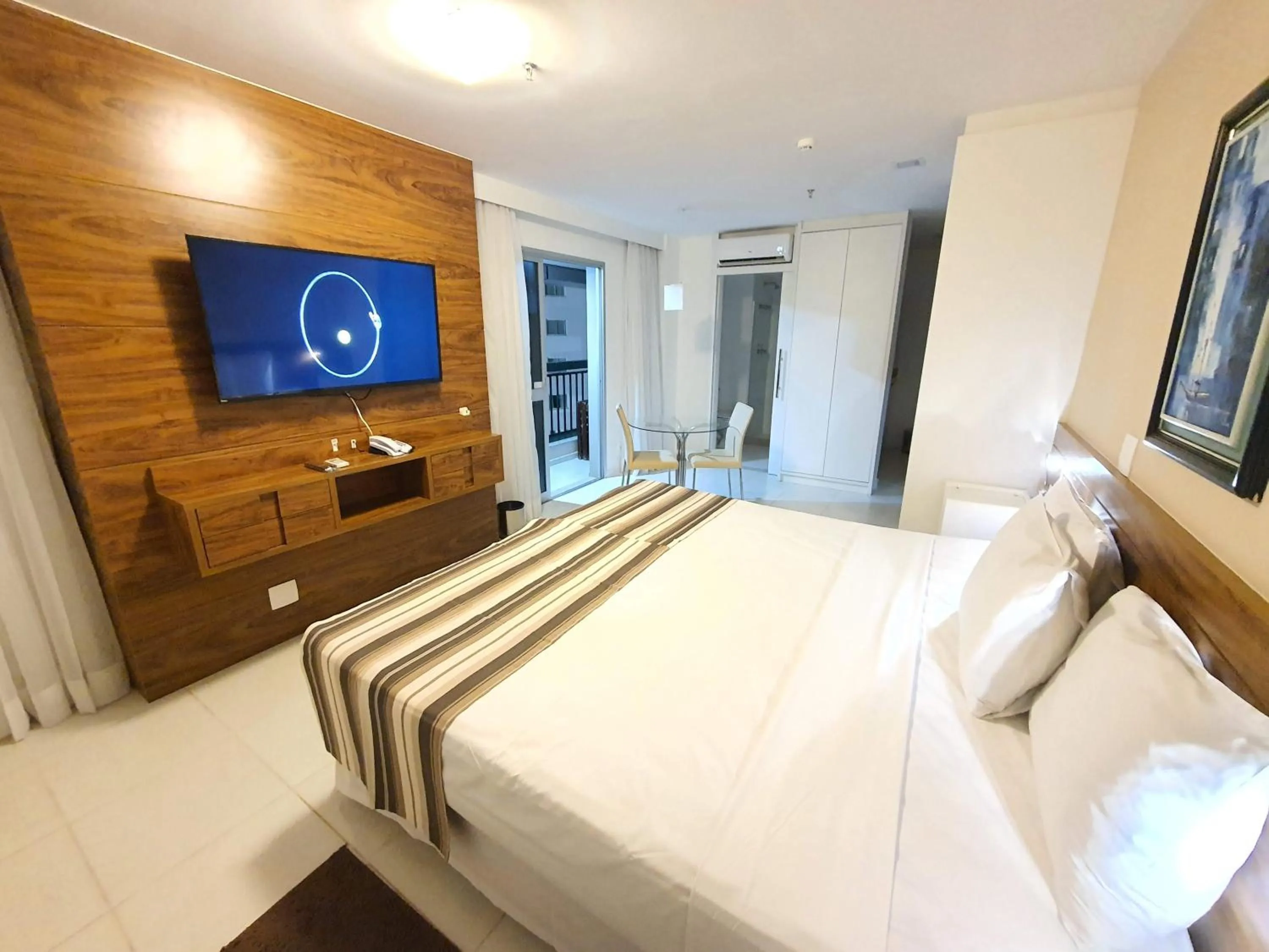 Communal lounge/ TV room, Bed in Flat Vision Executivo Premium By Rei dos Flats