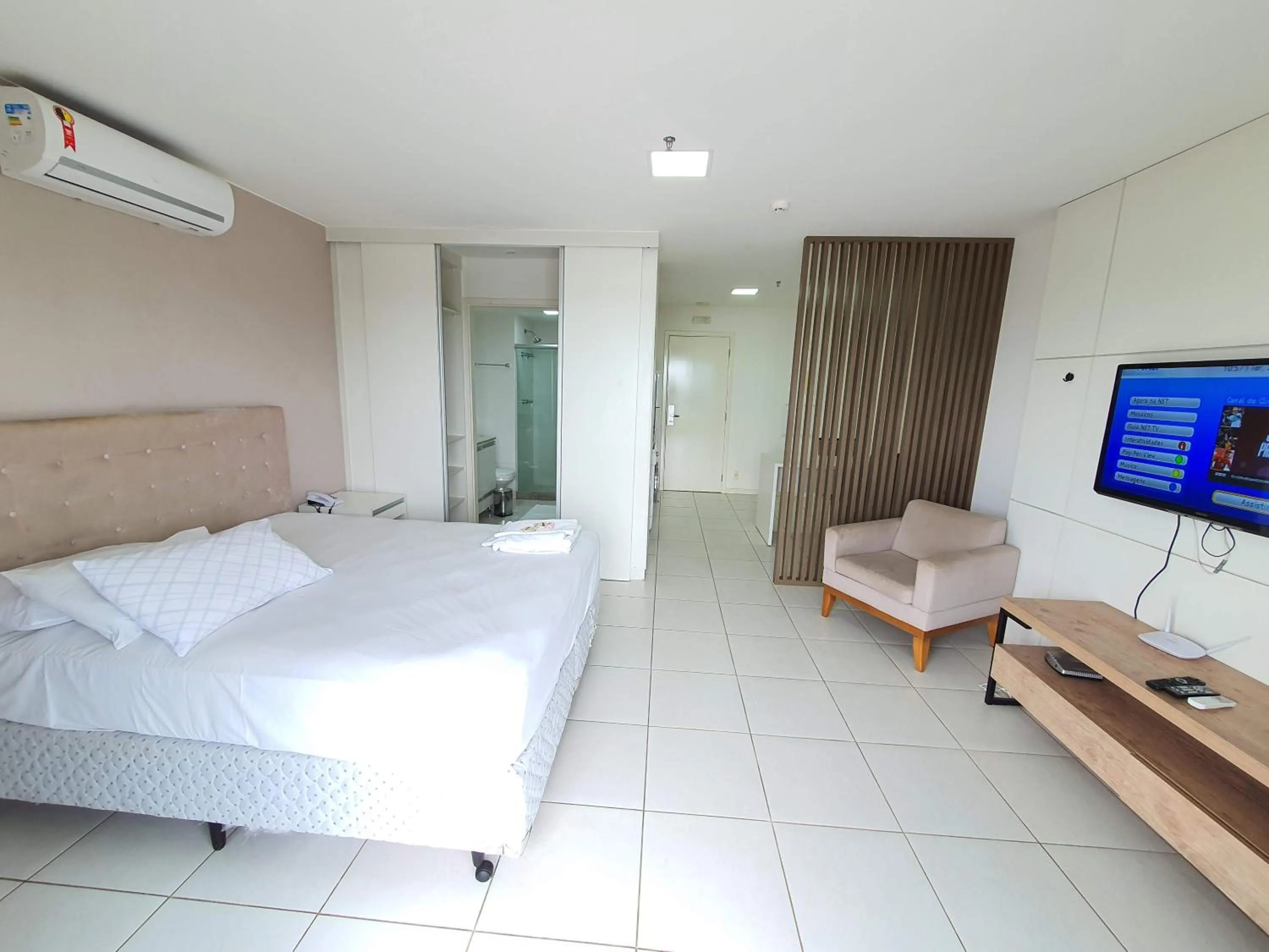 Communal lounge/ TV room, Bed in Flat Vision Executivo Premium By Rei dos Flats