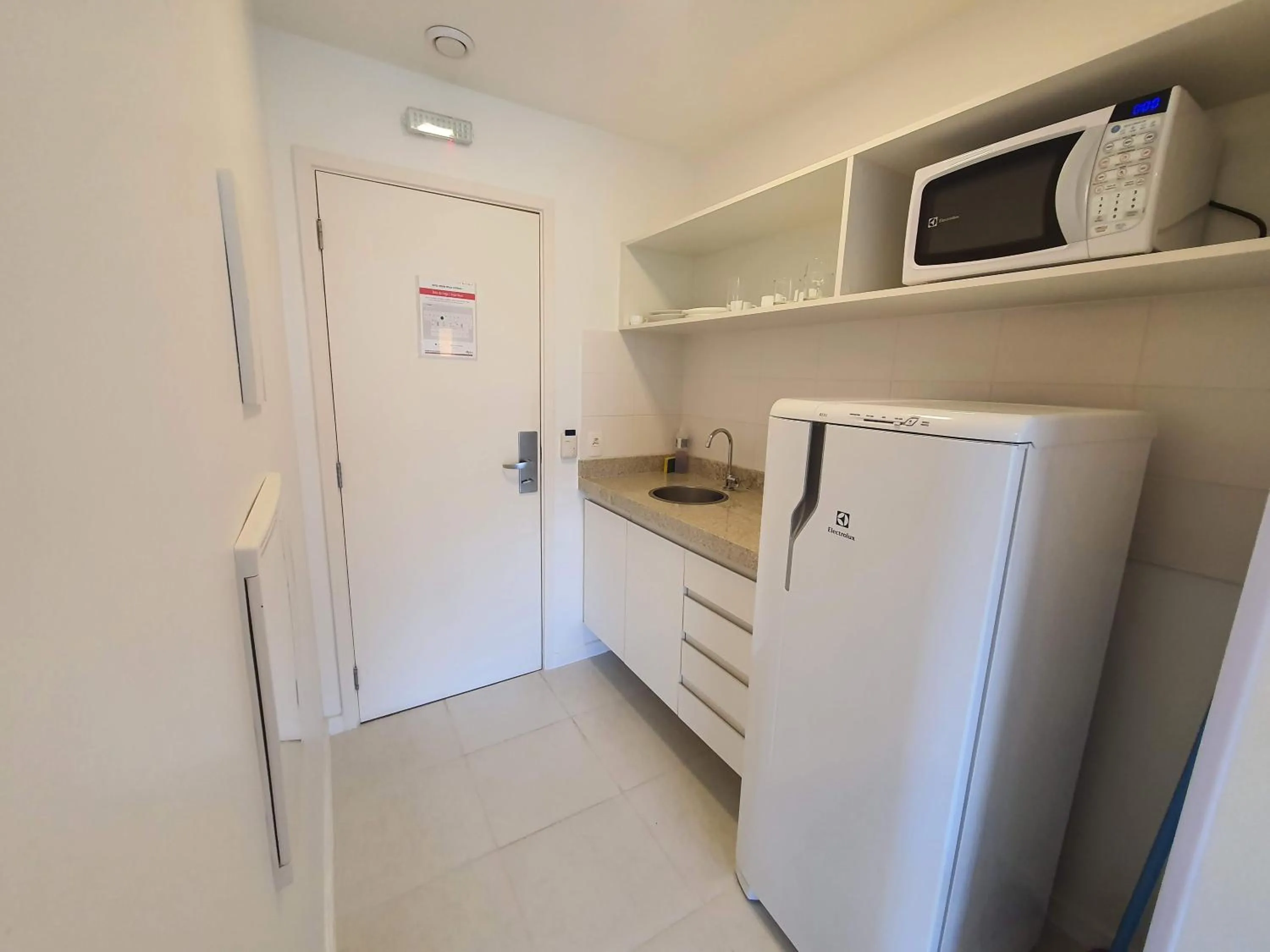 Kitchen or kitchenette in Flat Vision Executivo Premium By Rei dos Flats