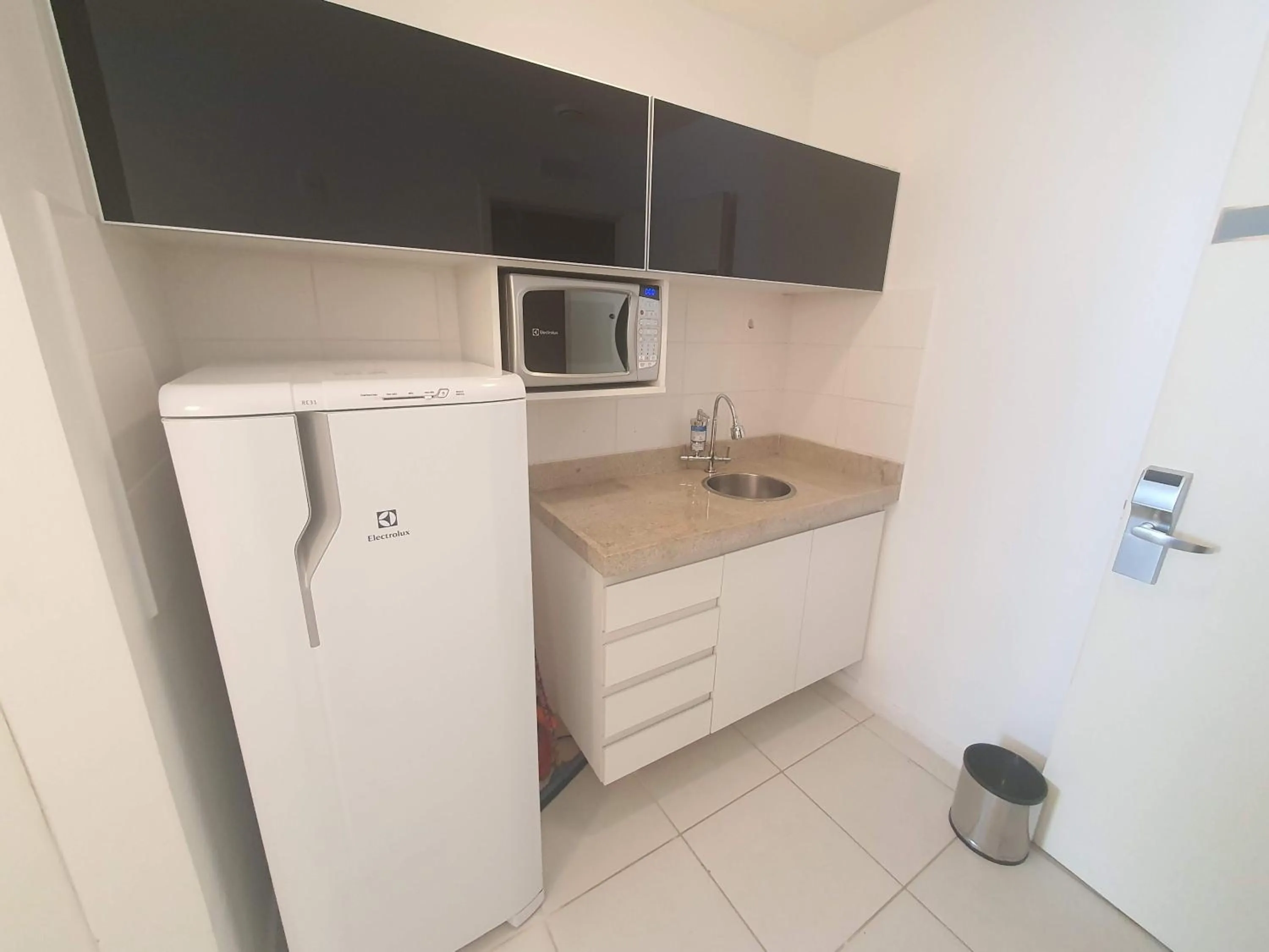 Kitchen or kitchenette in Flat Vision Executivo Premium By Rei dos Flats