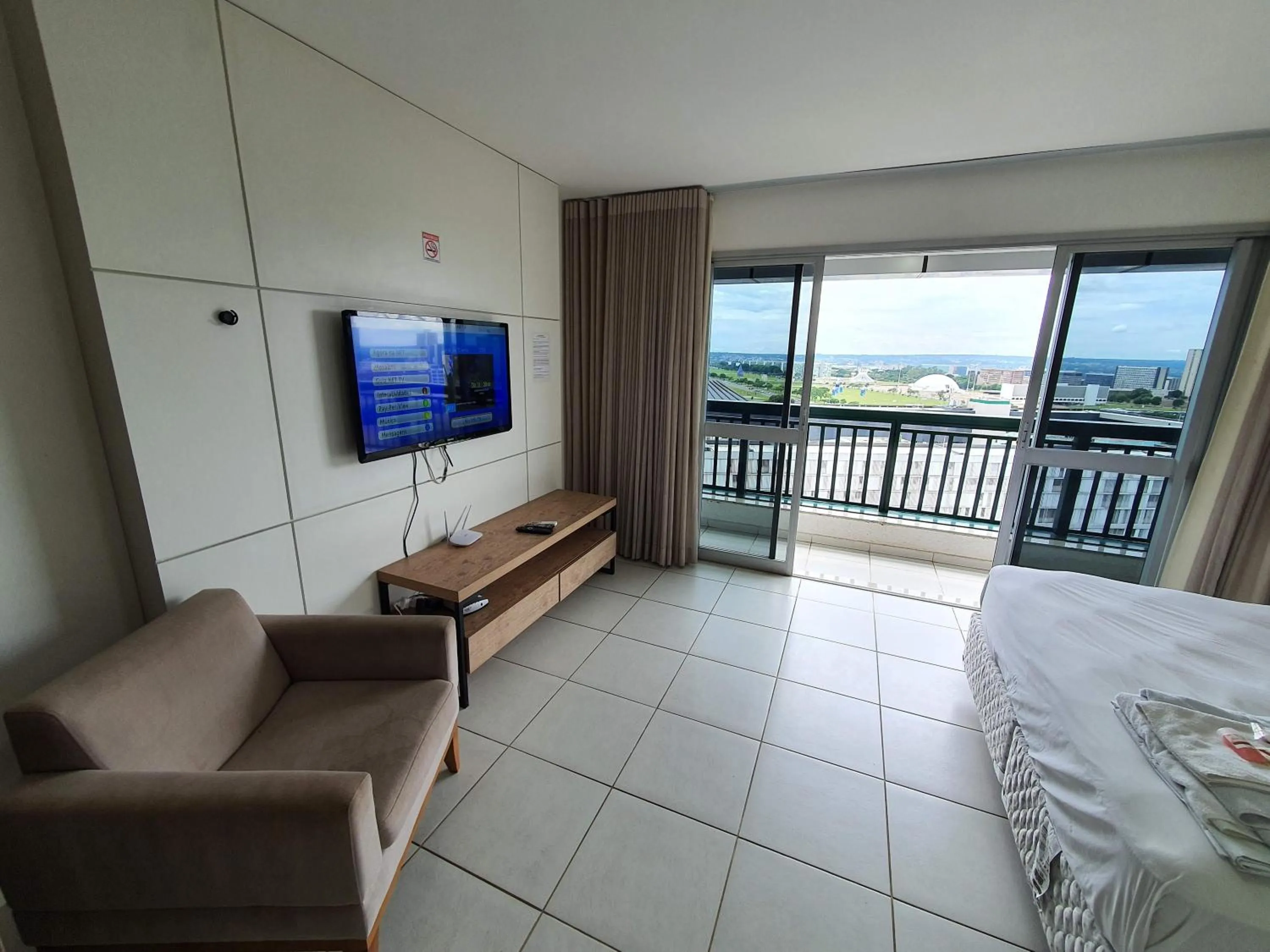 Communal lounge/ TV room, Bed in Flat Vision Executivo Premium By Rei dos Flats