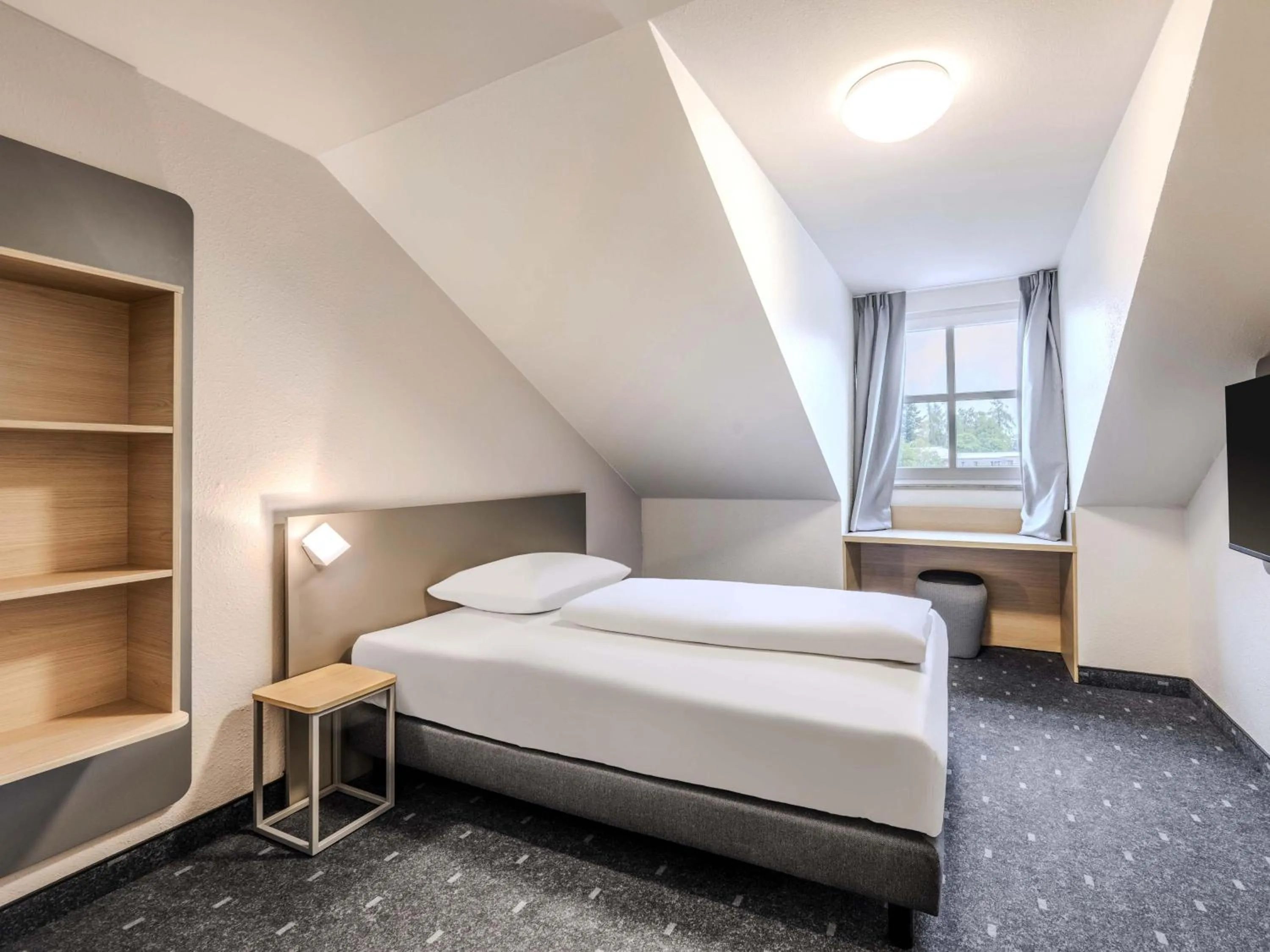 Photo of the whole room, Bed in B&B HOTEL Passau-Süd