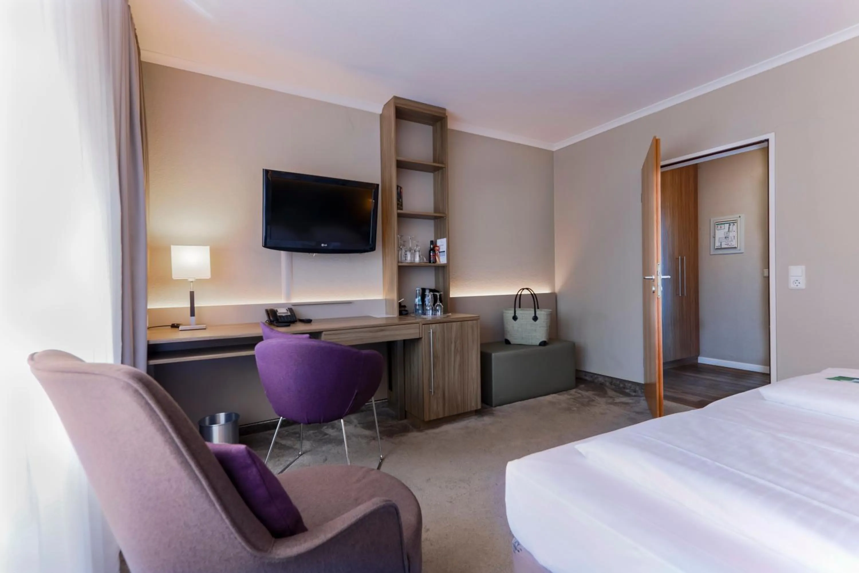 Photo of the whole room, Bed in Upstalsboom Parkhotel