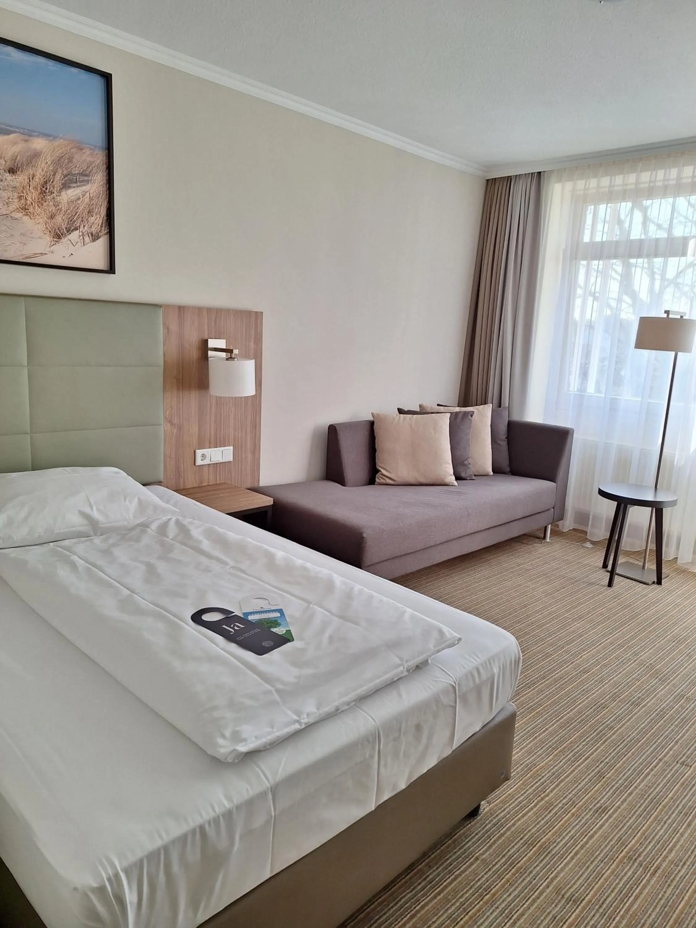 Bed in Upstalsboom Parkhotel