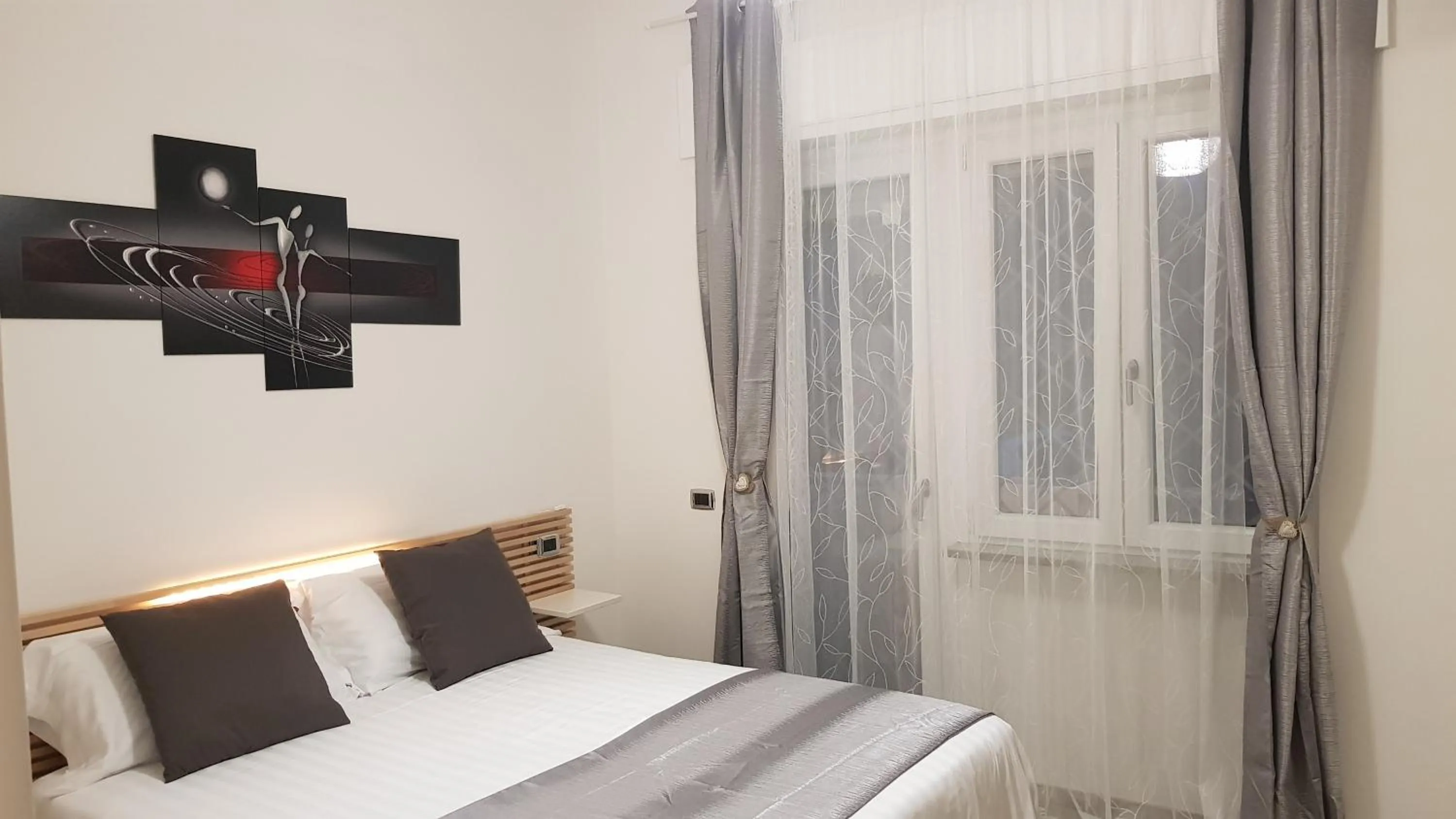 Bed in THAT'S AMORE FIUMICINO Airport