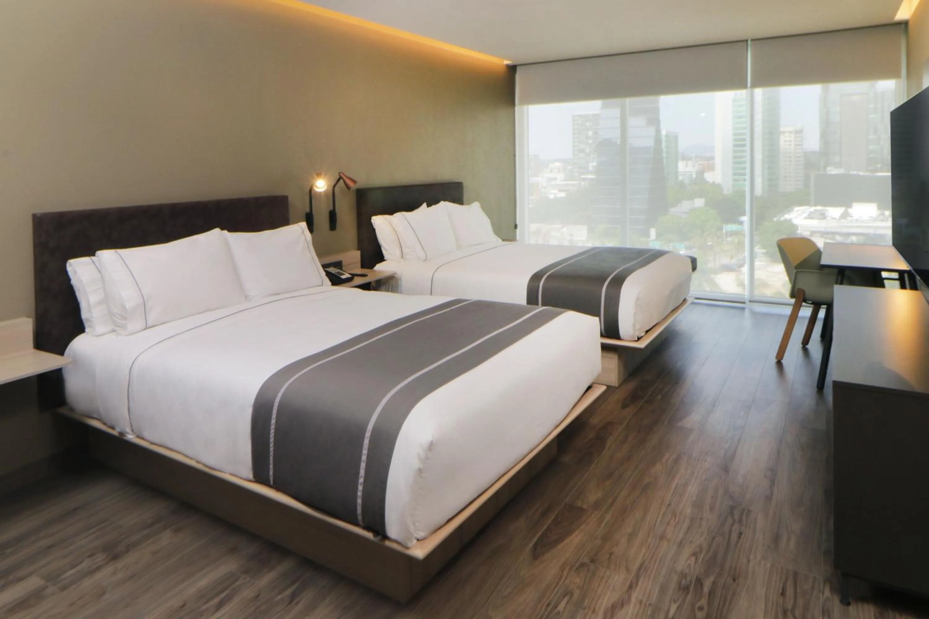 Photo of the whole room, Bed in City Express Plus by Marriott Guadalajara Providencia