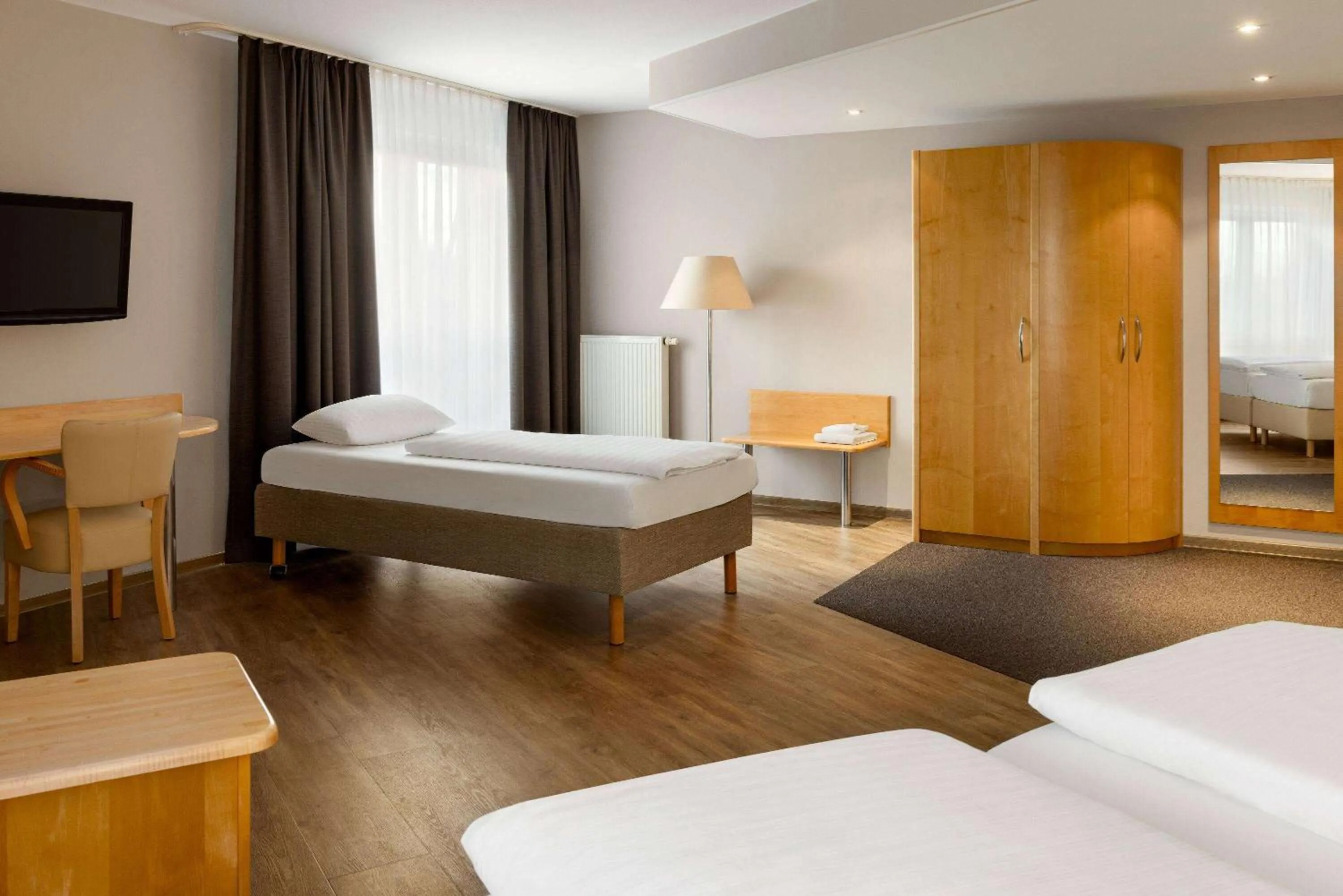 Photo of the whole room, Bed in Amedia Dresden Elbpromenade, Trademark Collection by Wyndham