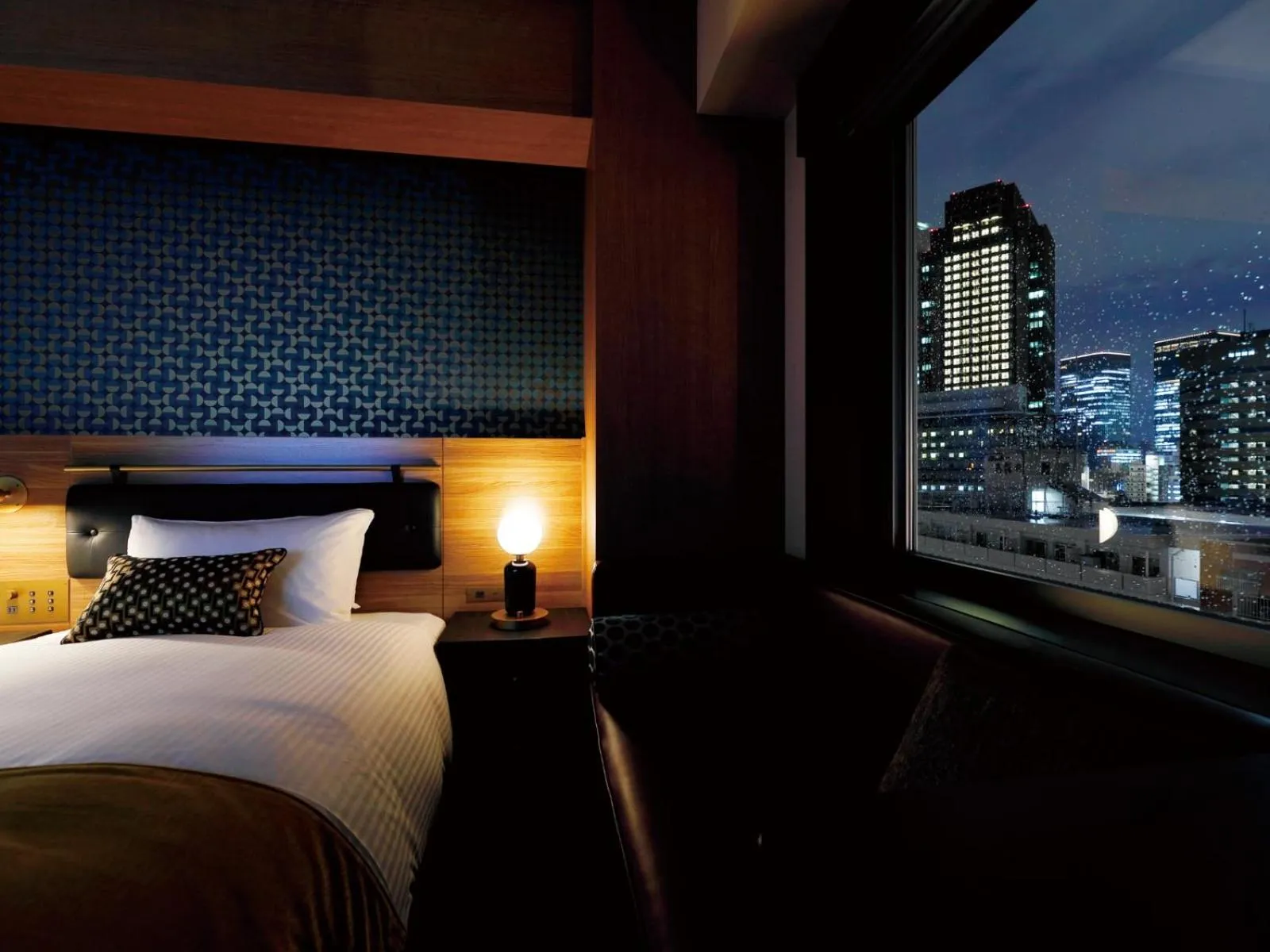 Bed in DEL style Osaka Shin Umeda by Daiwa Roynet Hotel