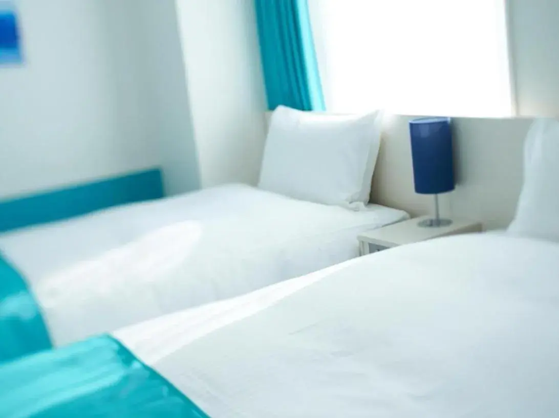 Bed in DEL style Osaka Shin Umeda by Daiwa Roynet Hotel Bed in DEL style Osaka Shin Umeda by Daiwa Roynet Hotel