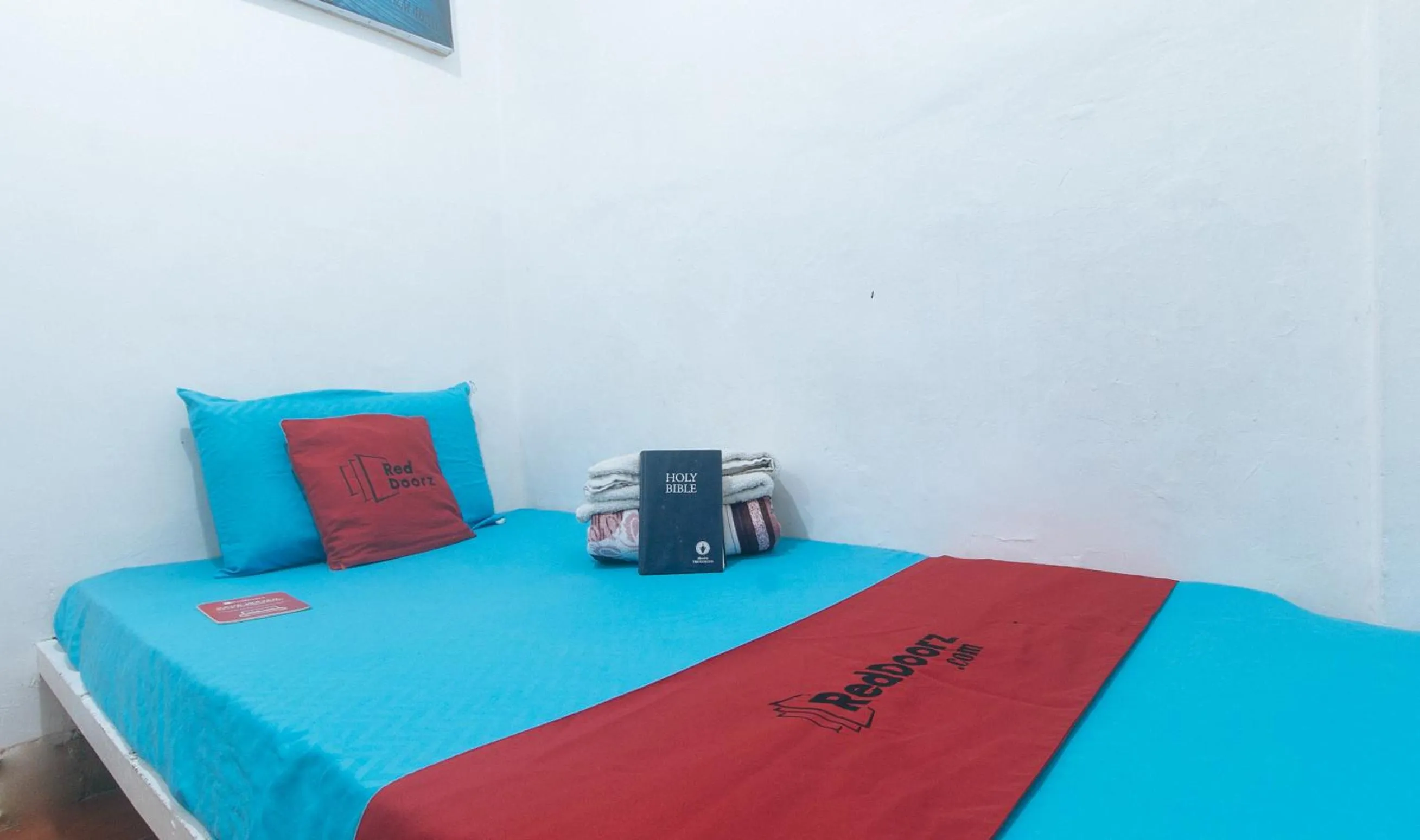 Bed in RedDoorz near OWWA Pasay