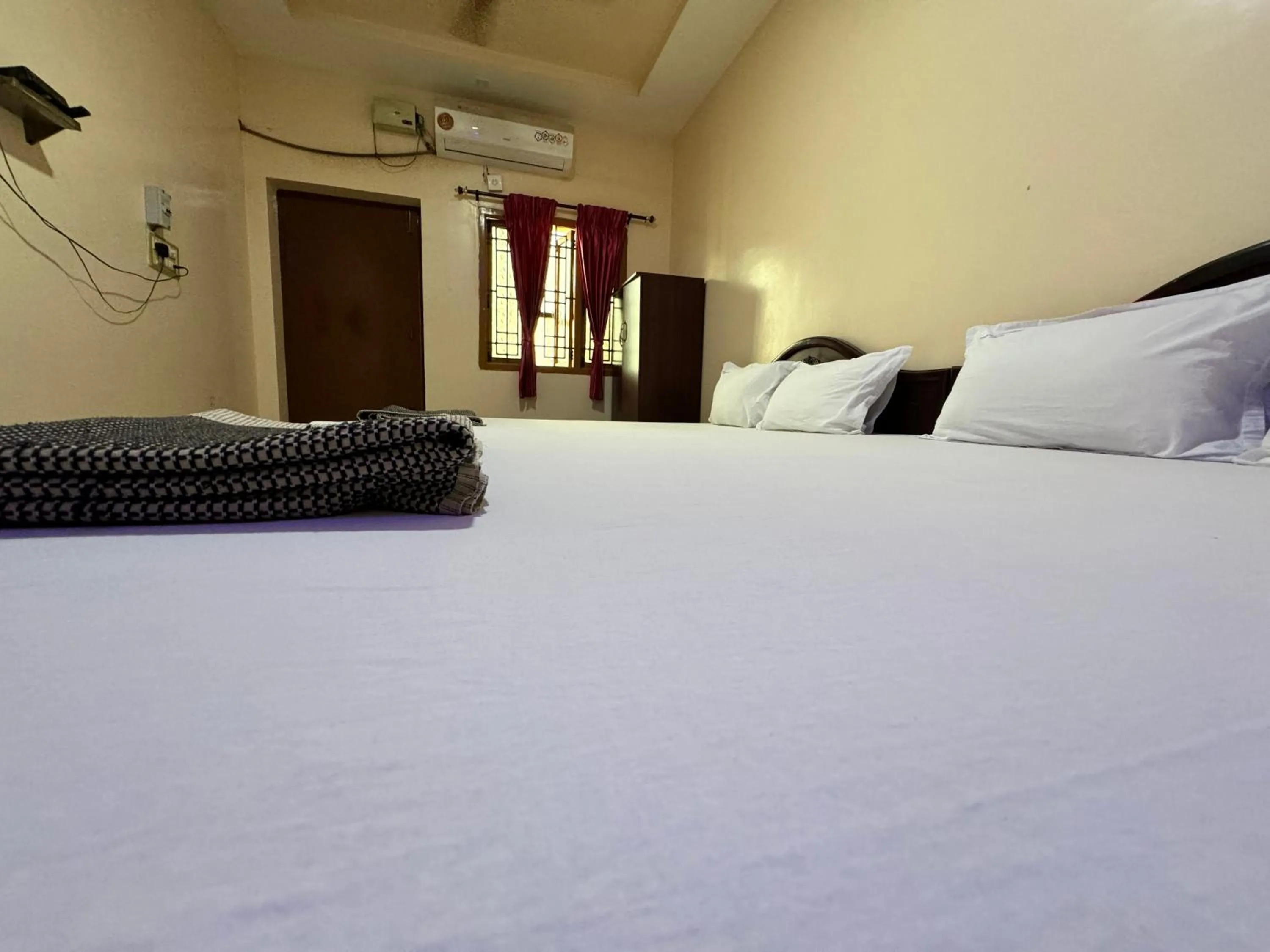 Bedroom, Bed in Sakthimurugan residency