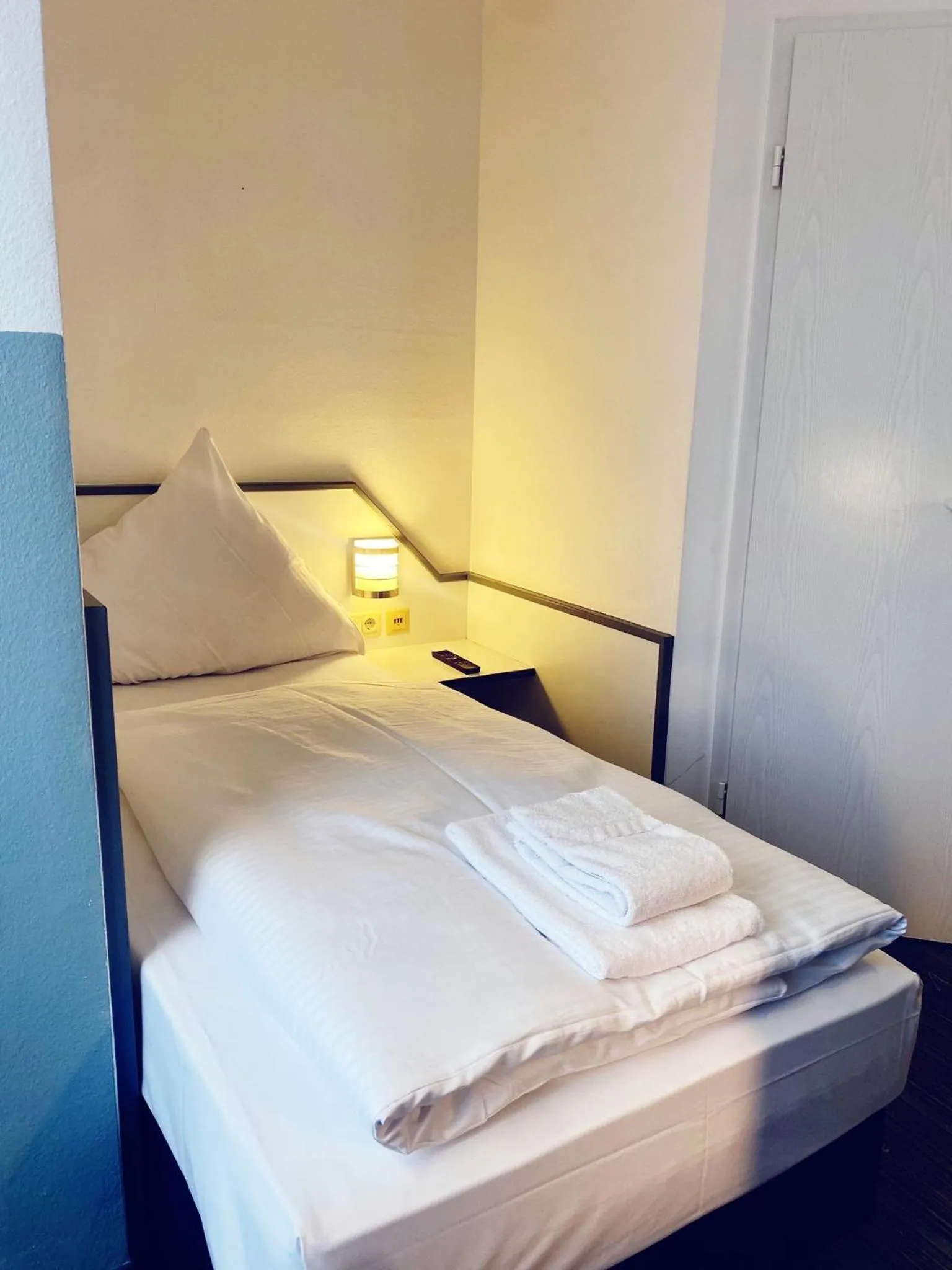 Bed in Hotel City Kräme am Römer - Self Check In