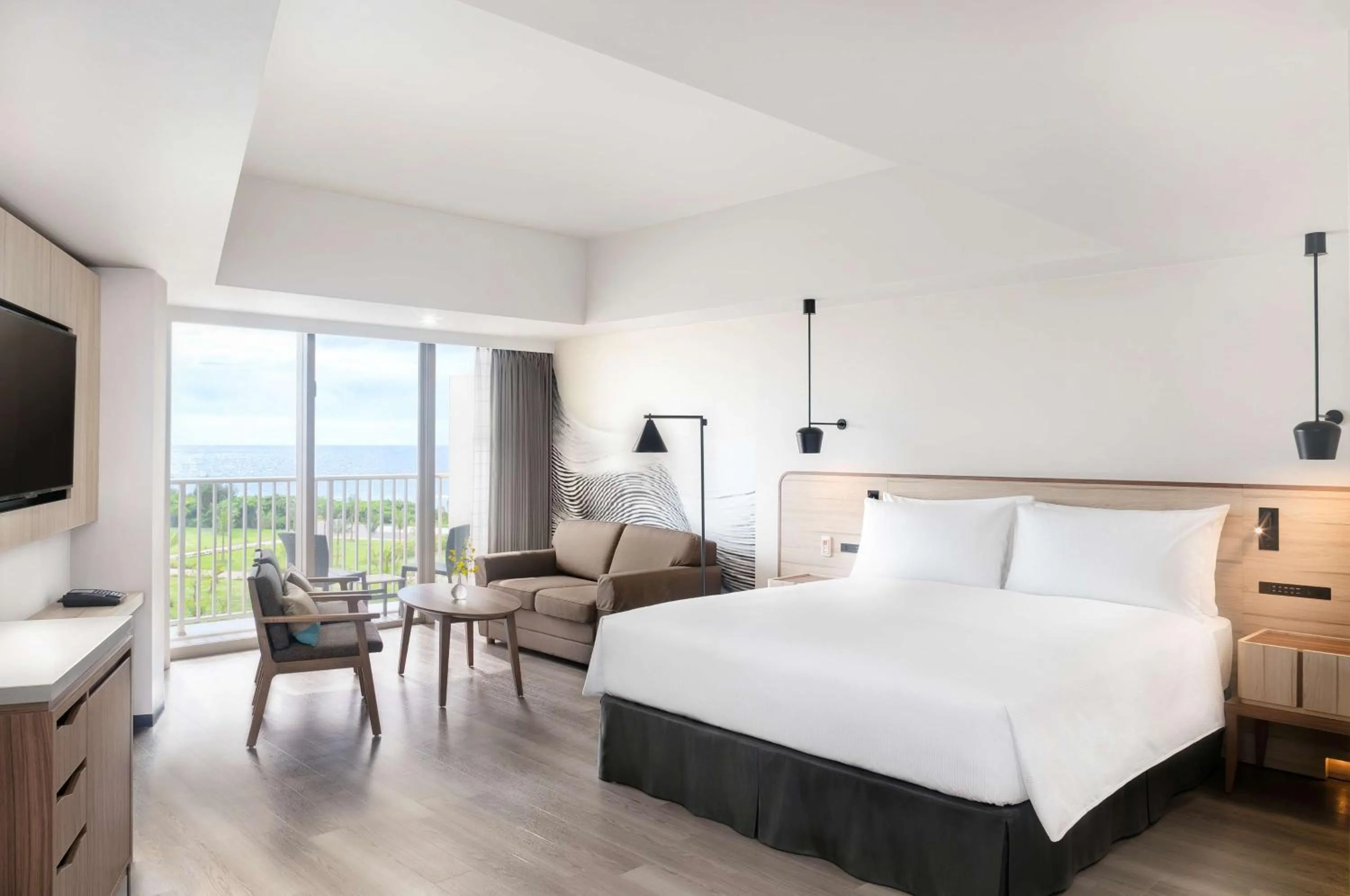 Living room, Bed in Hilton Okinawa Sesoko Resort