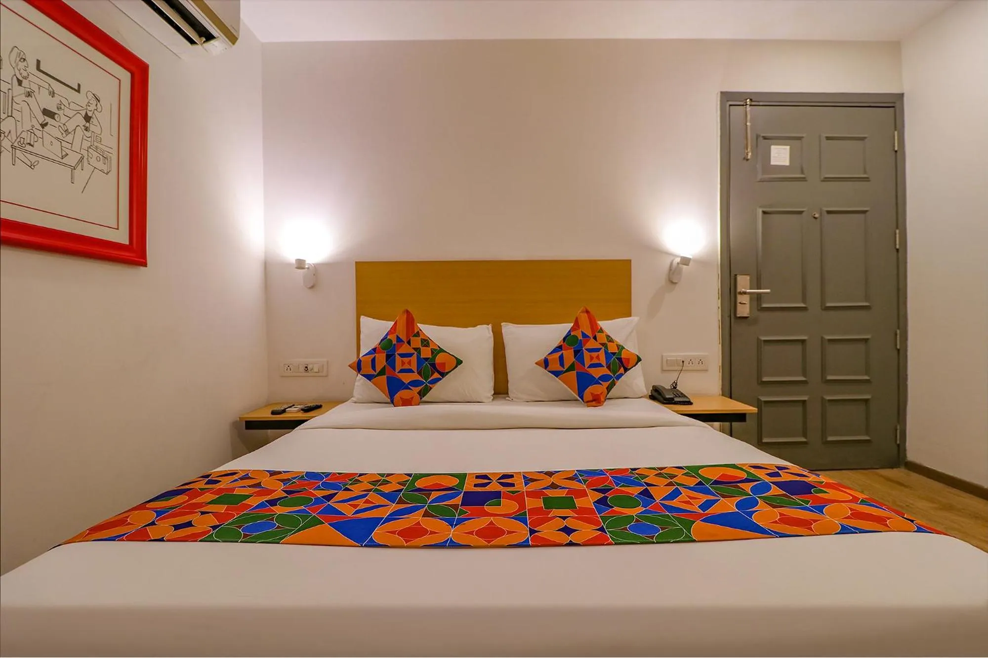 Bed in FabHotel Hargobind Enclave