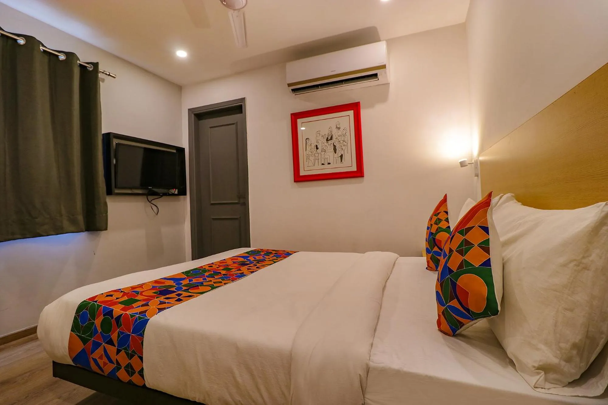 Bed in FabHotel Hargobind Enclave