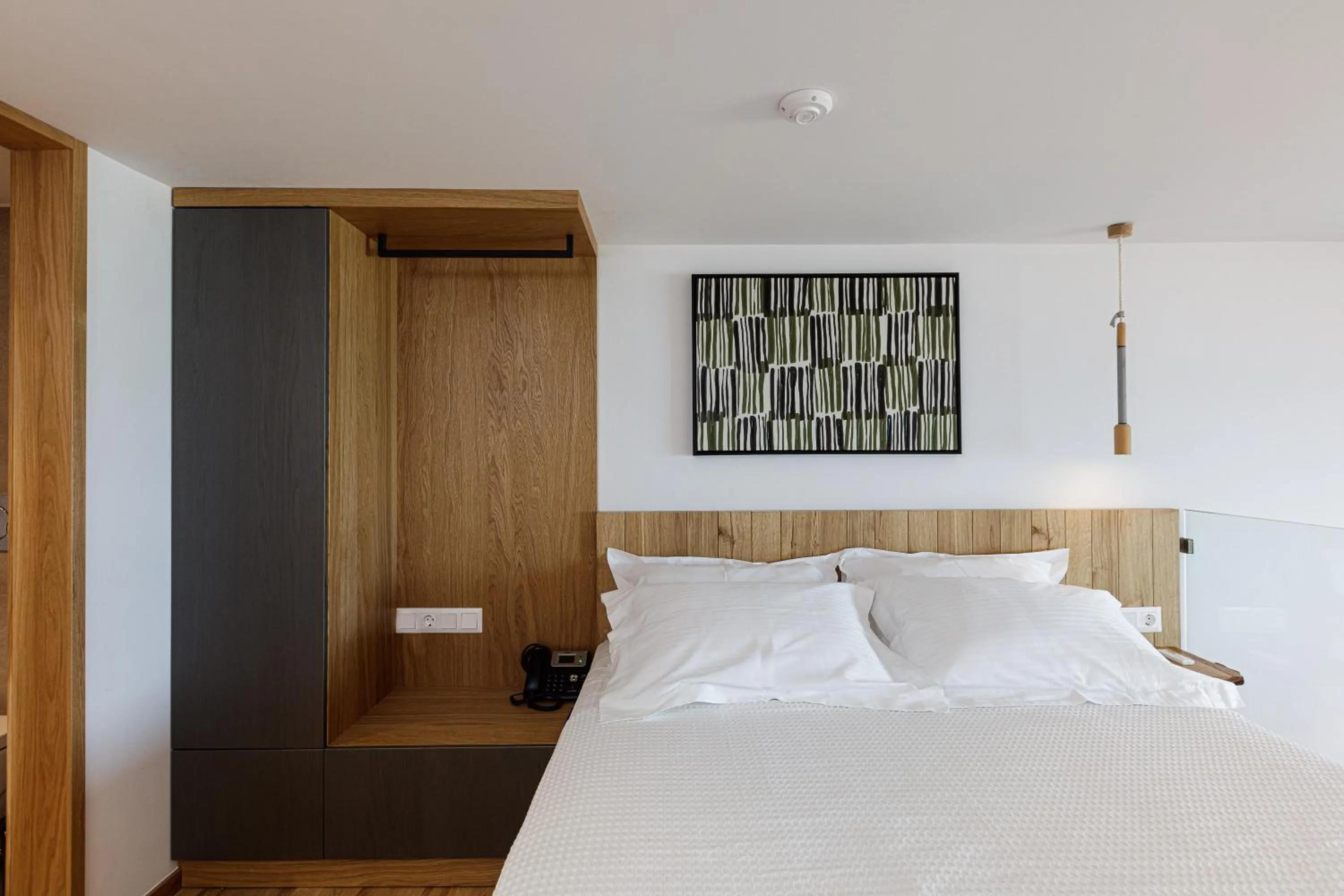 Bed in North Coast Seaside Suites