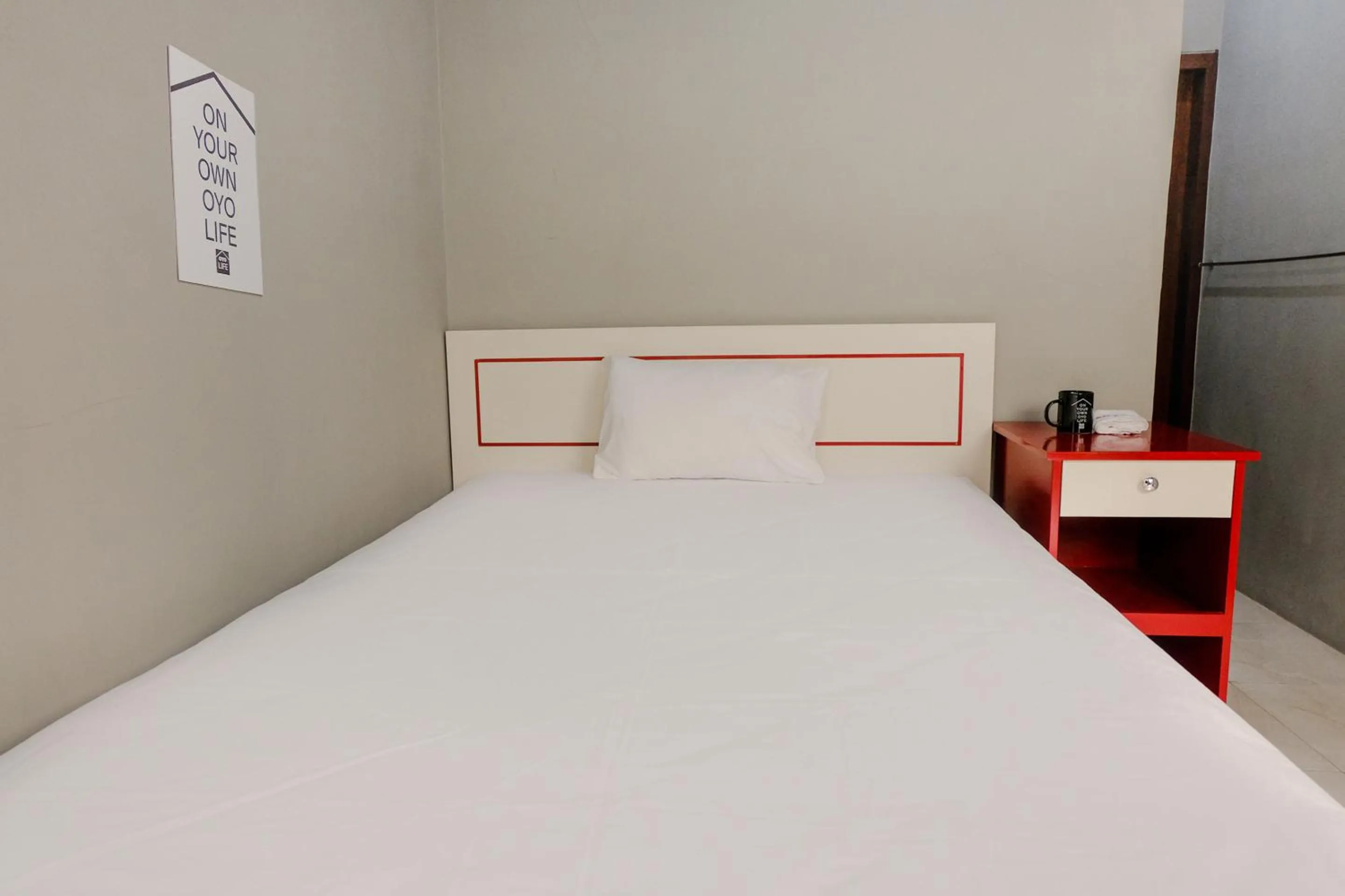 Bed in Zulfina Homestay Syariah Mitra RedDoorz