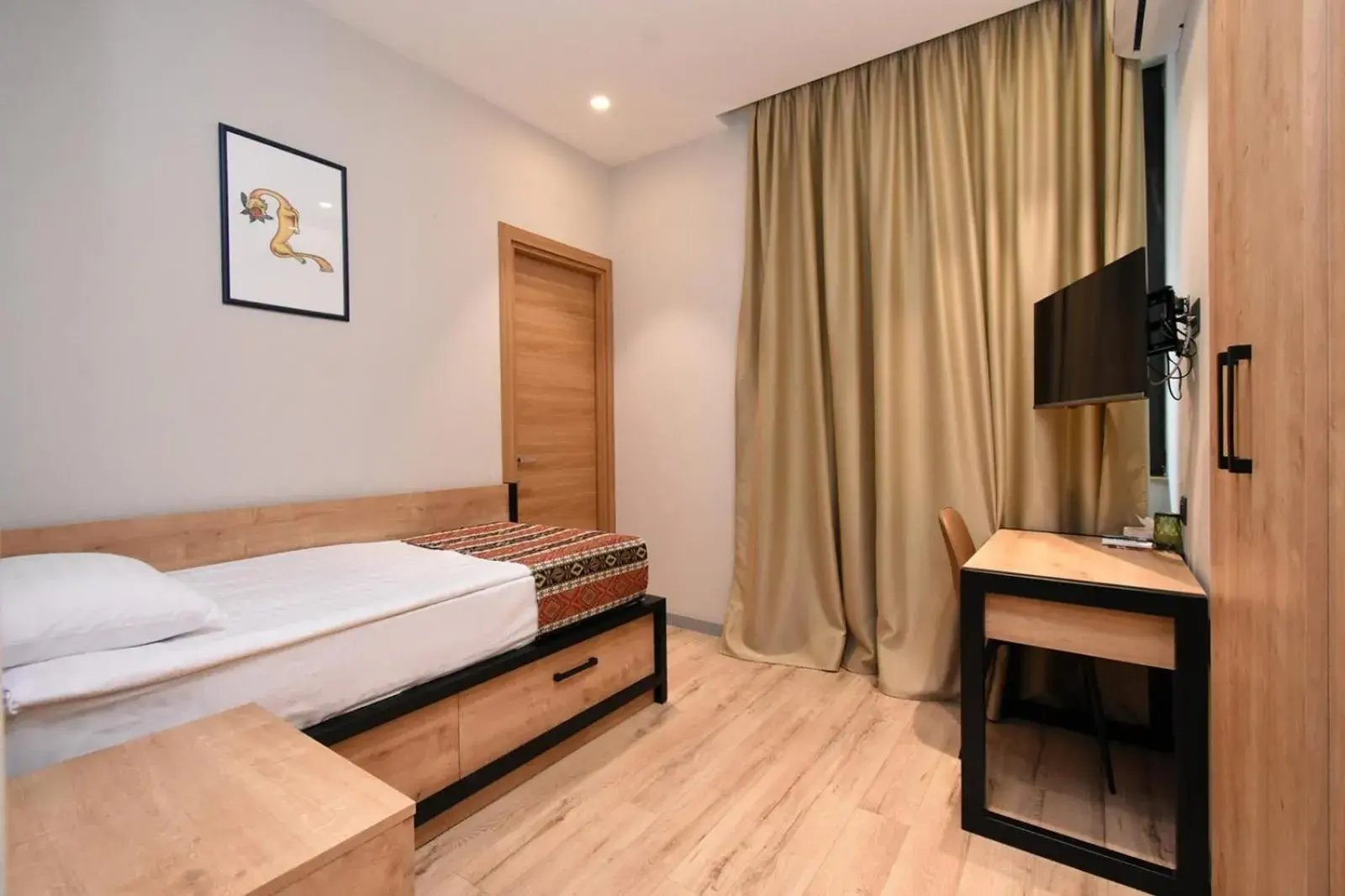 wardrobe, Bed in Andor Hotel wardrobe, Bed in Andor Hotel