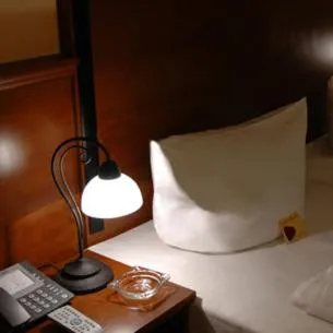 Decorative detail, Bed in City Hotel Mercator