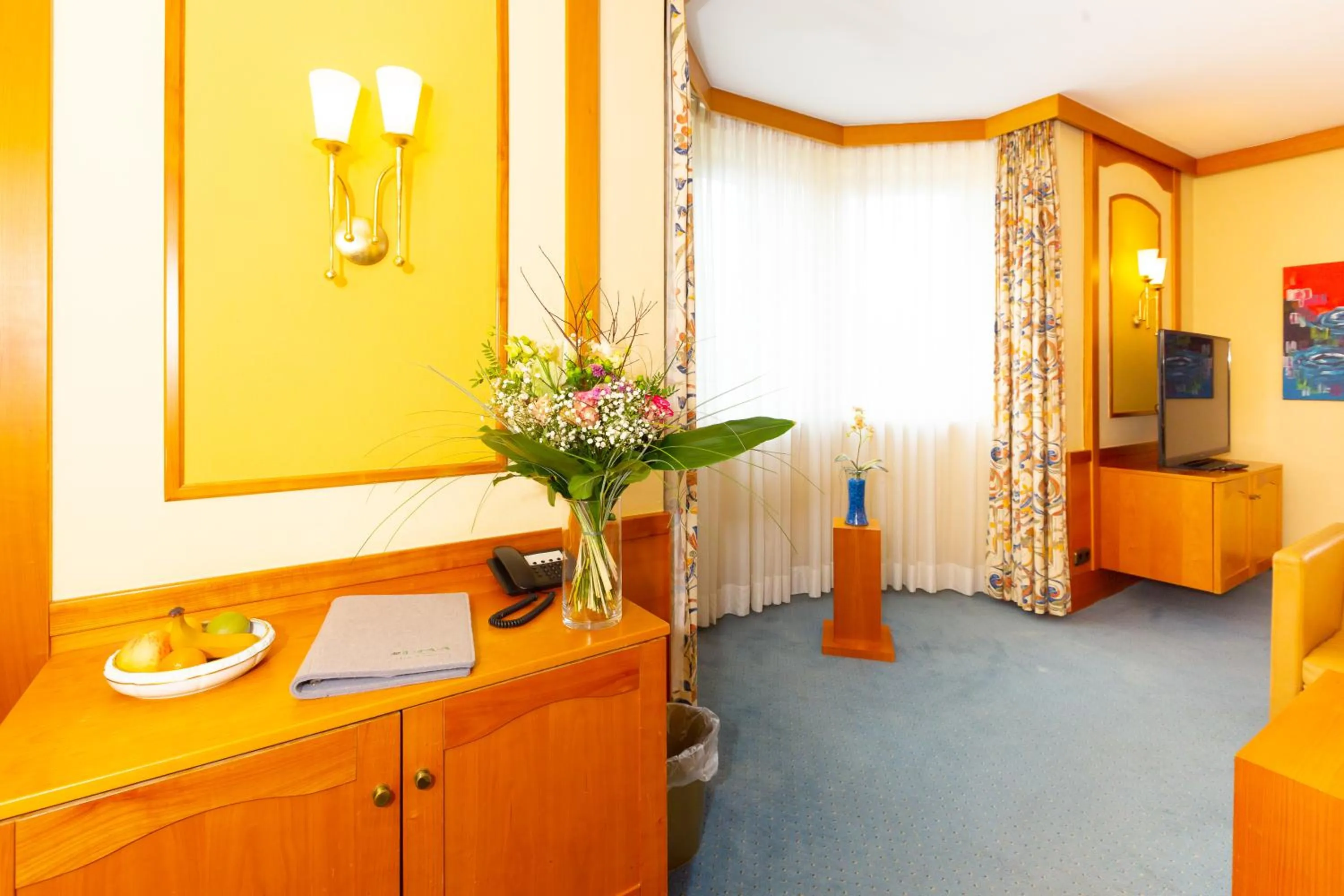 Living room, Bed in Parkhotel Traunstein