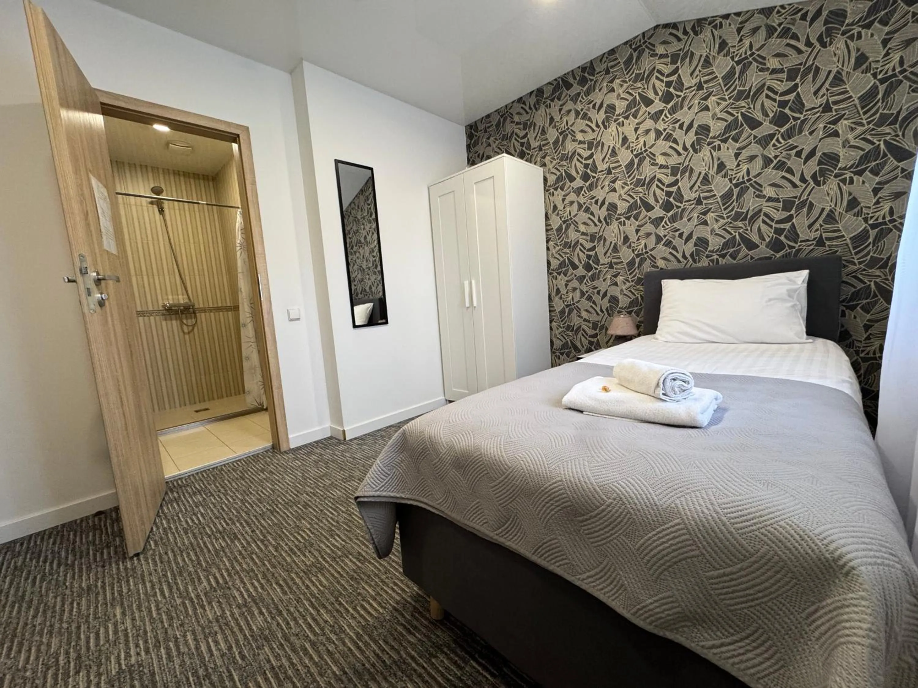 Bedroom, Bed in Grey apartments "Easy Kaunas"