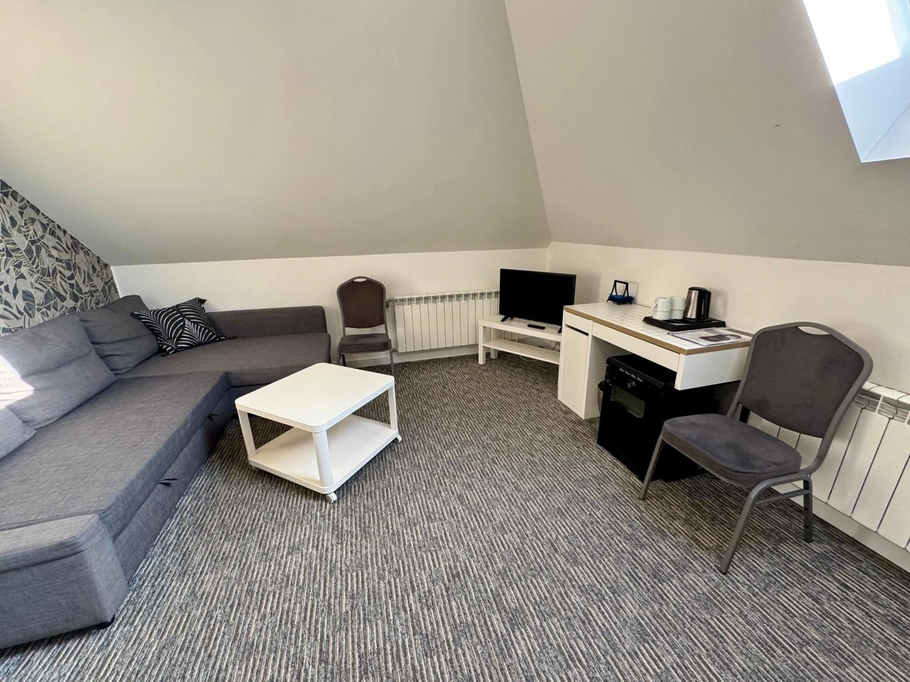 TV and multimedia in Grey apartments "Easy Kaunas"