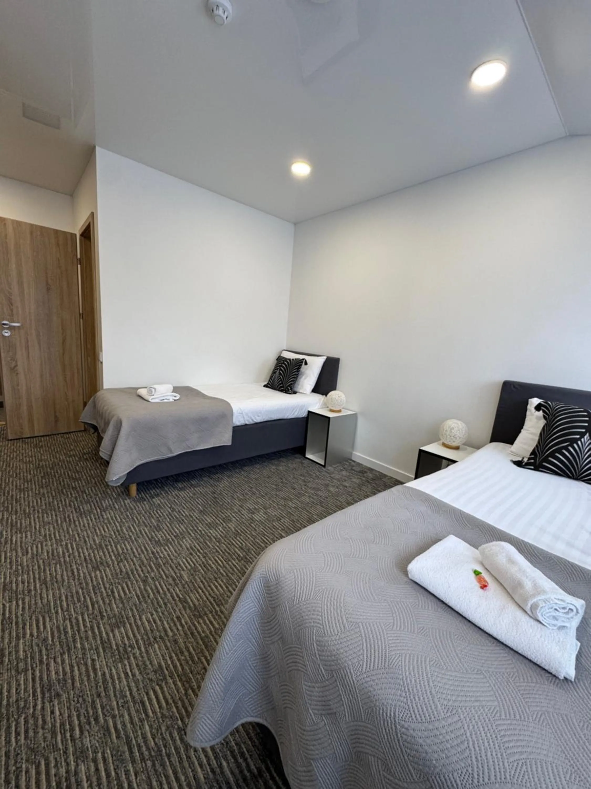 Bedroom, Bed in Grey apartments "Easy Kaunas"