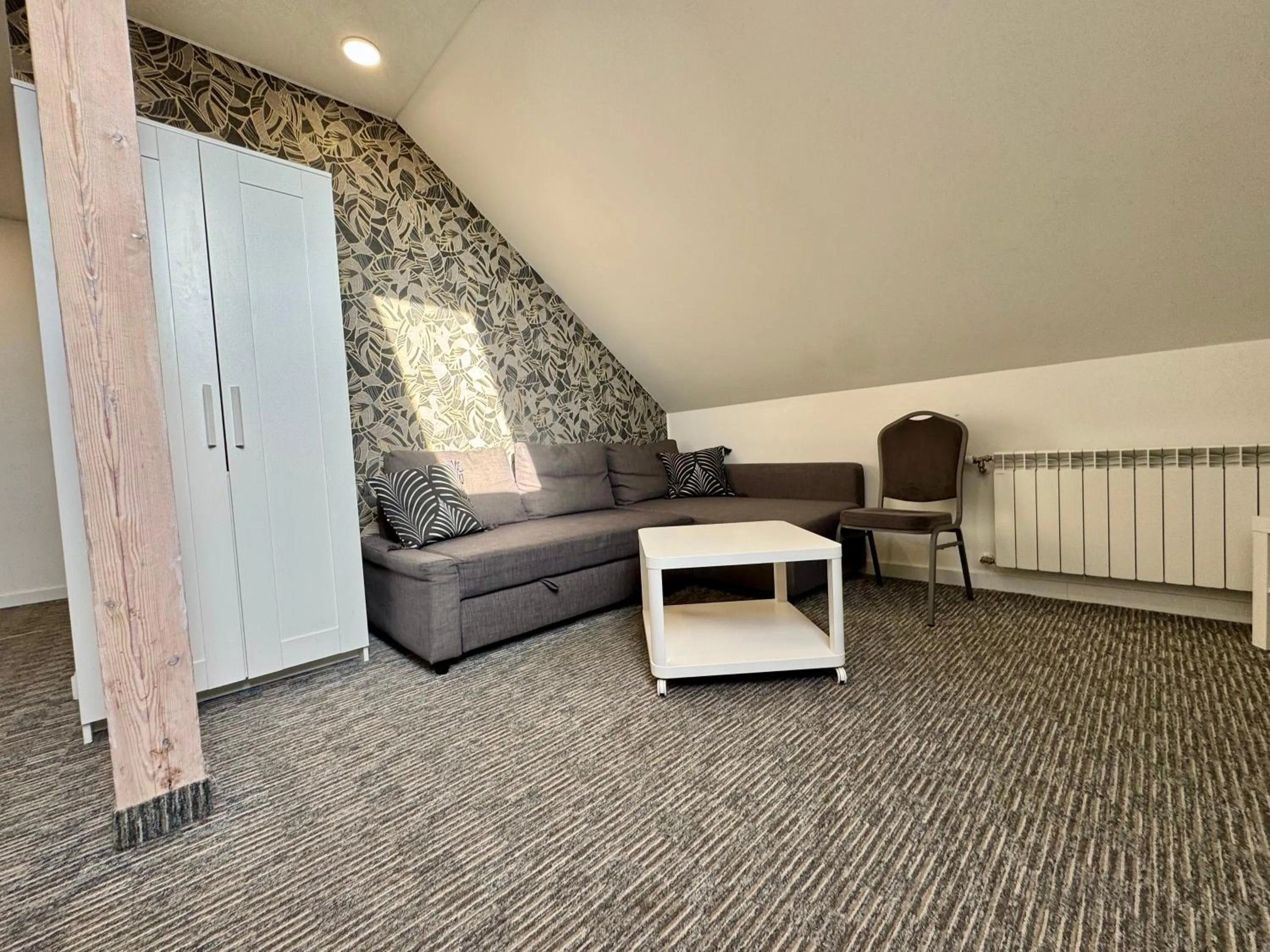 Living room in Grey apartments "Easy Kaunas"