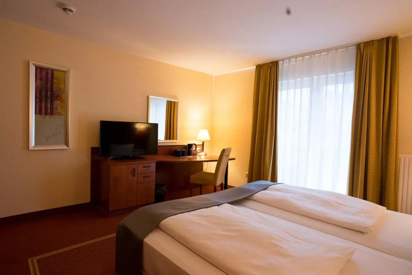 Photo of the whole room, Bed in Hotel Fulda Mitte