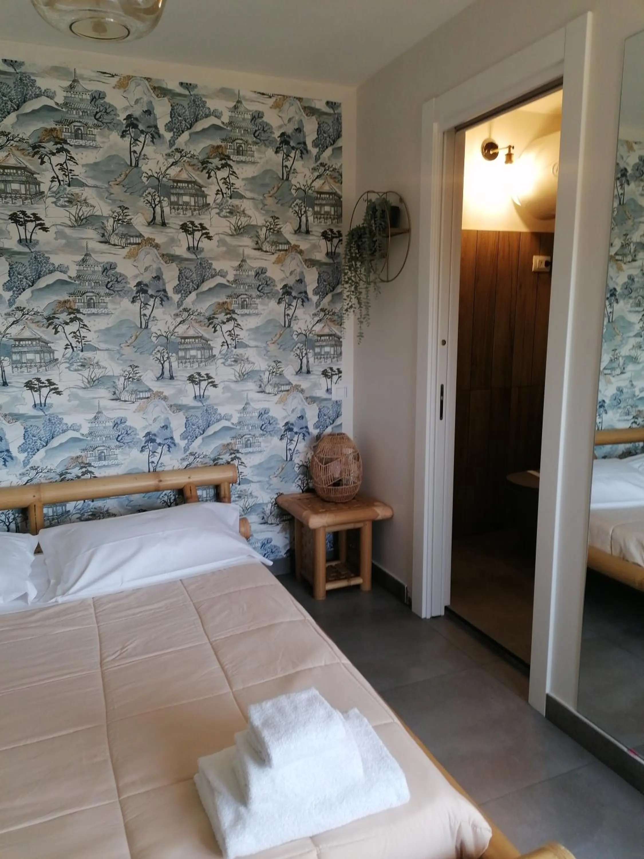 Bed in Le Boutique Luxury Rooms diffused in Historic Center