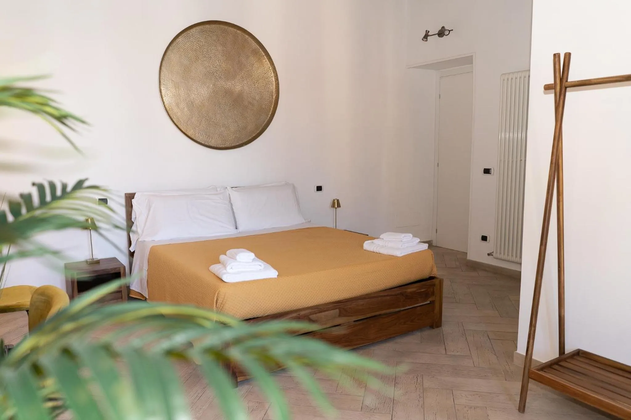 Bed in Le Boutique Luxury Rooms diffused in Historic Center