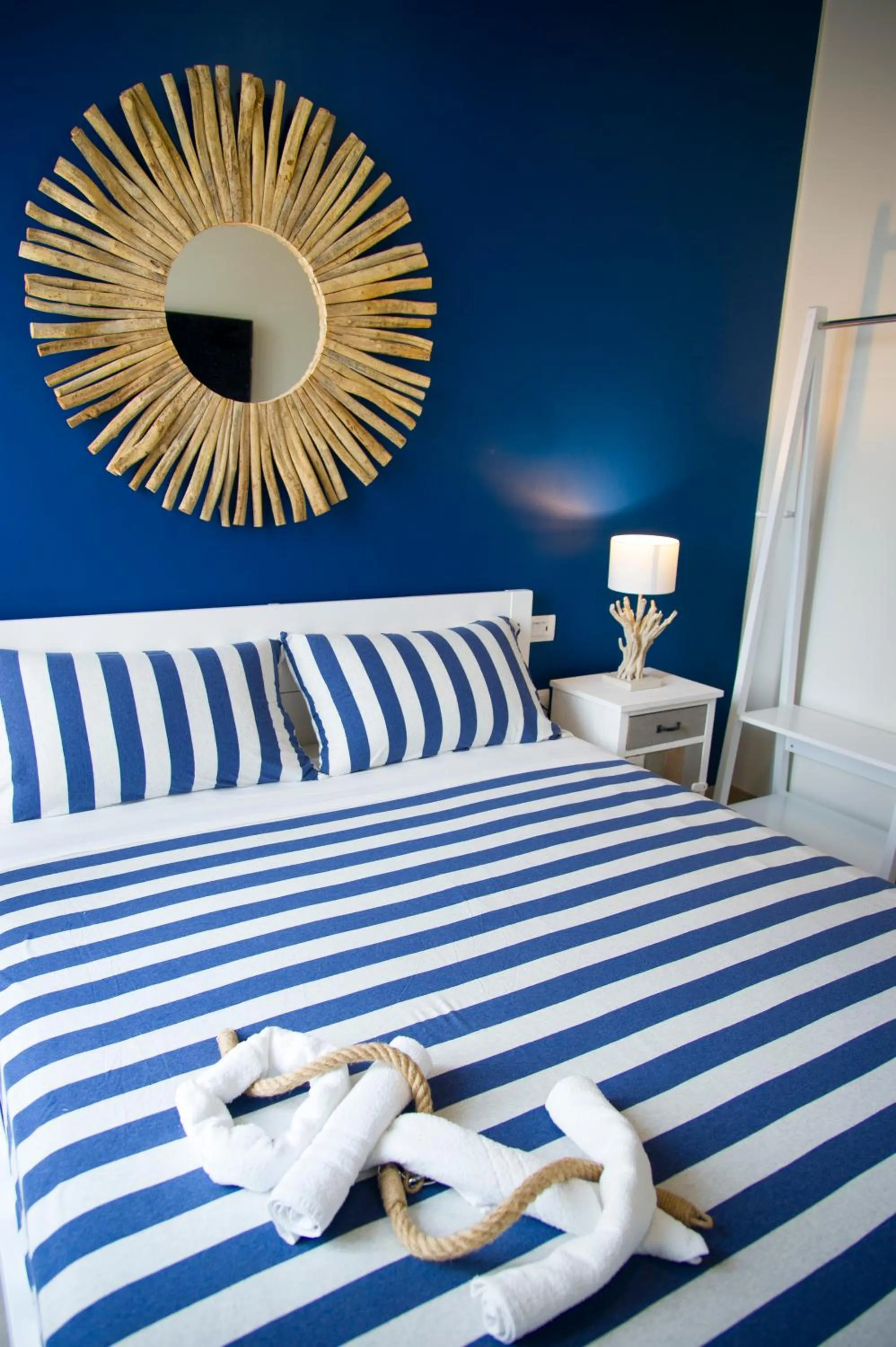 Bed in Le Boutique Luxury Rooms diffused in Historic Center