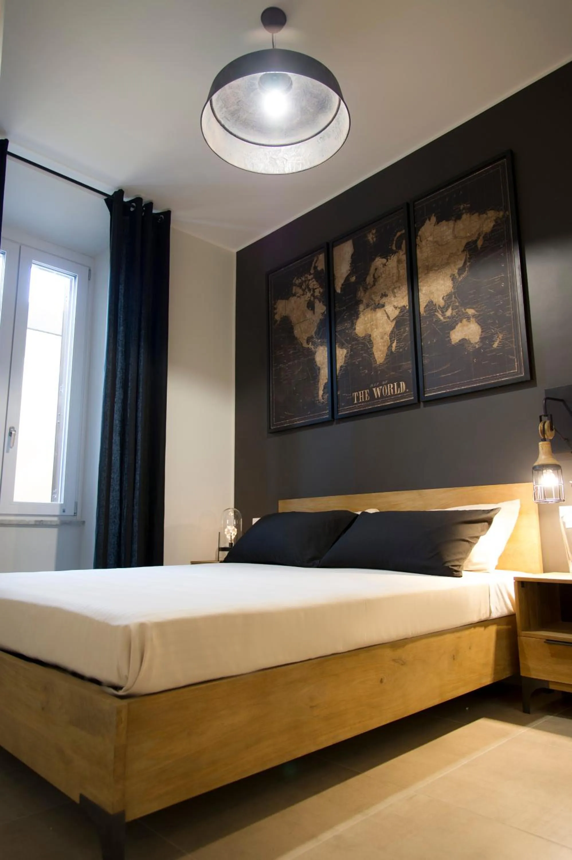 Bed in Le Boutique Luxury Rooms diffused in Historic Center