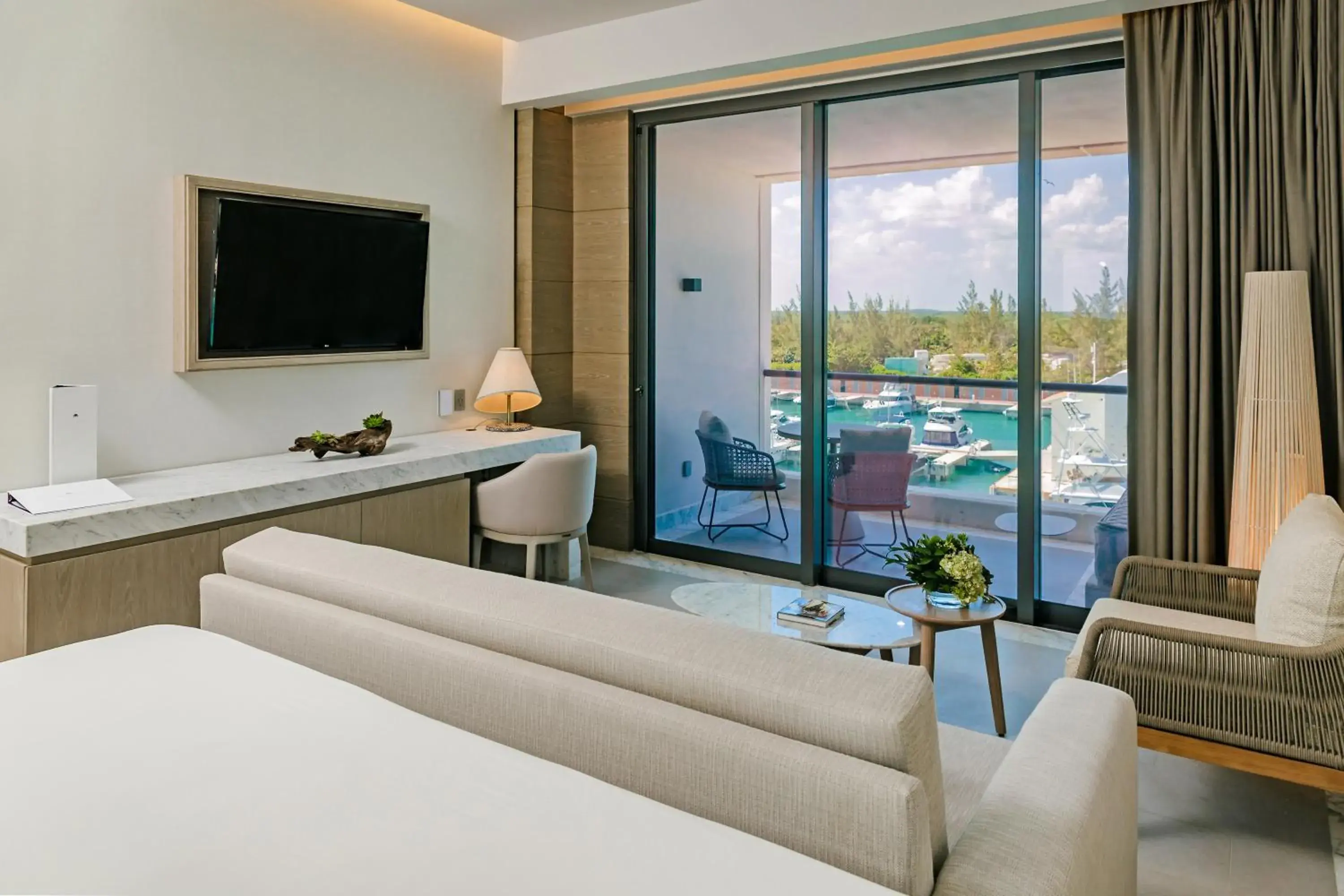 TV and multimedia, Bed in SLS Playa Mujeres - ALL Inclusive Collection TV and multimedia, Bed in SLS Playa Mujeres - ALL Inclusive Collection