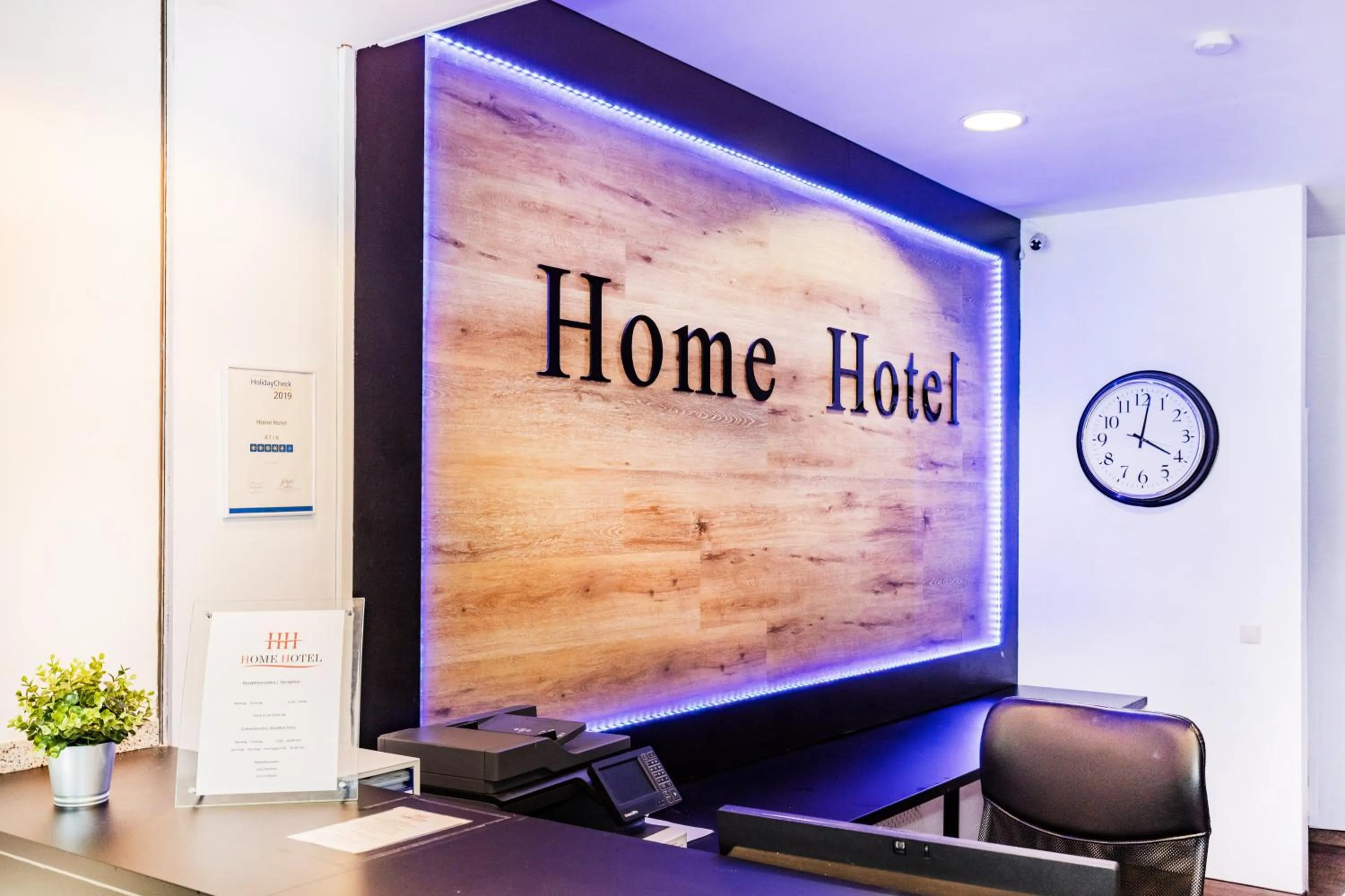 Lobby or reception in Home Hotel