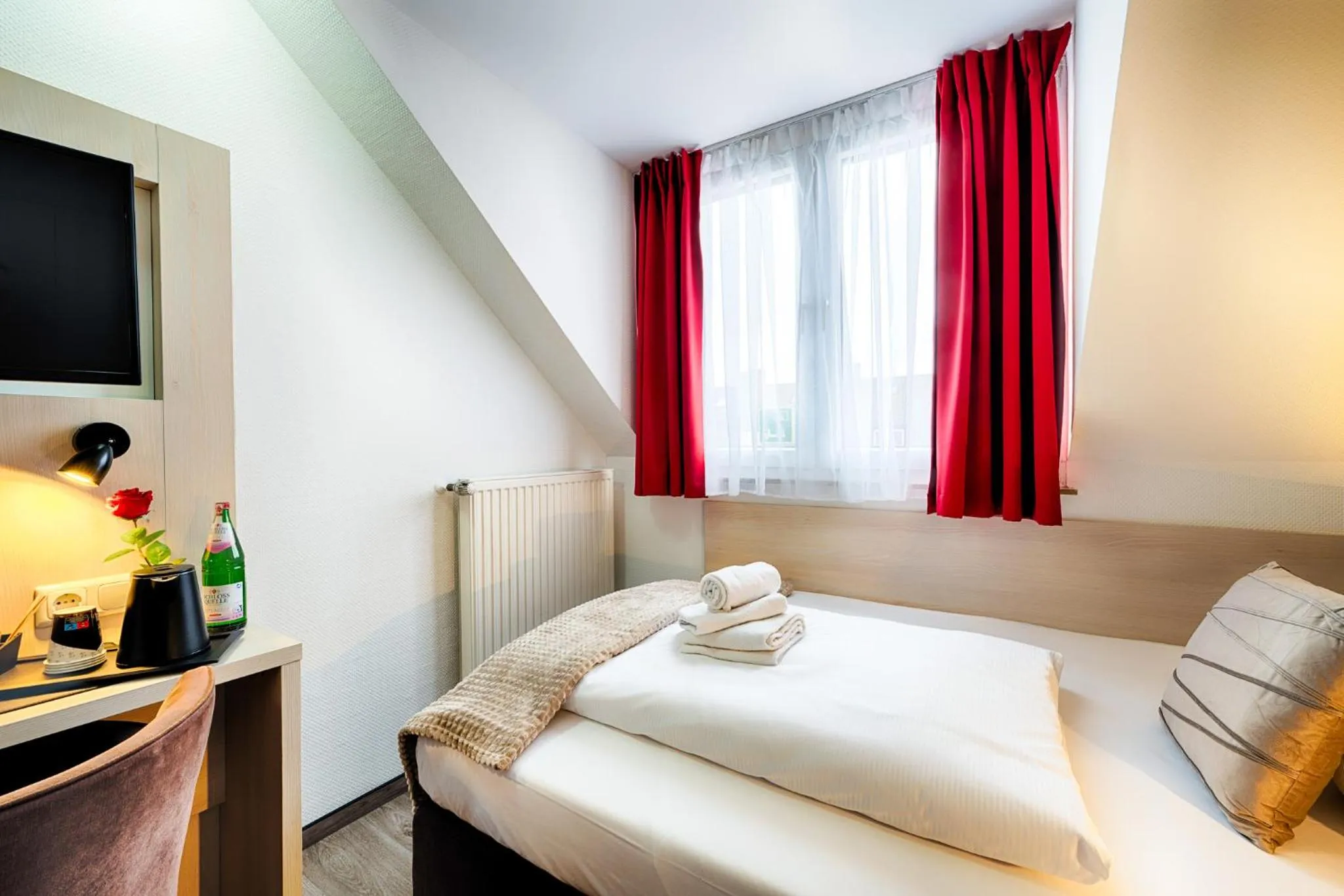 Photo of the whole room, Bed in Home Hotel