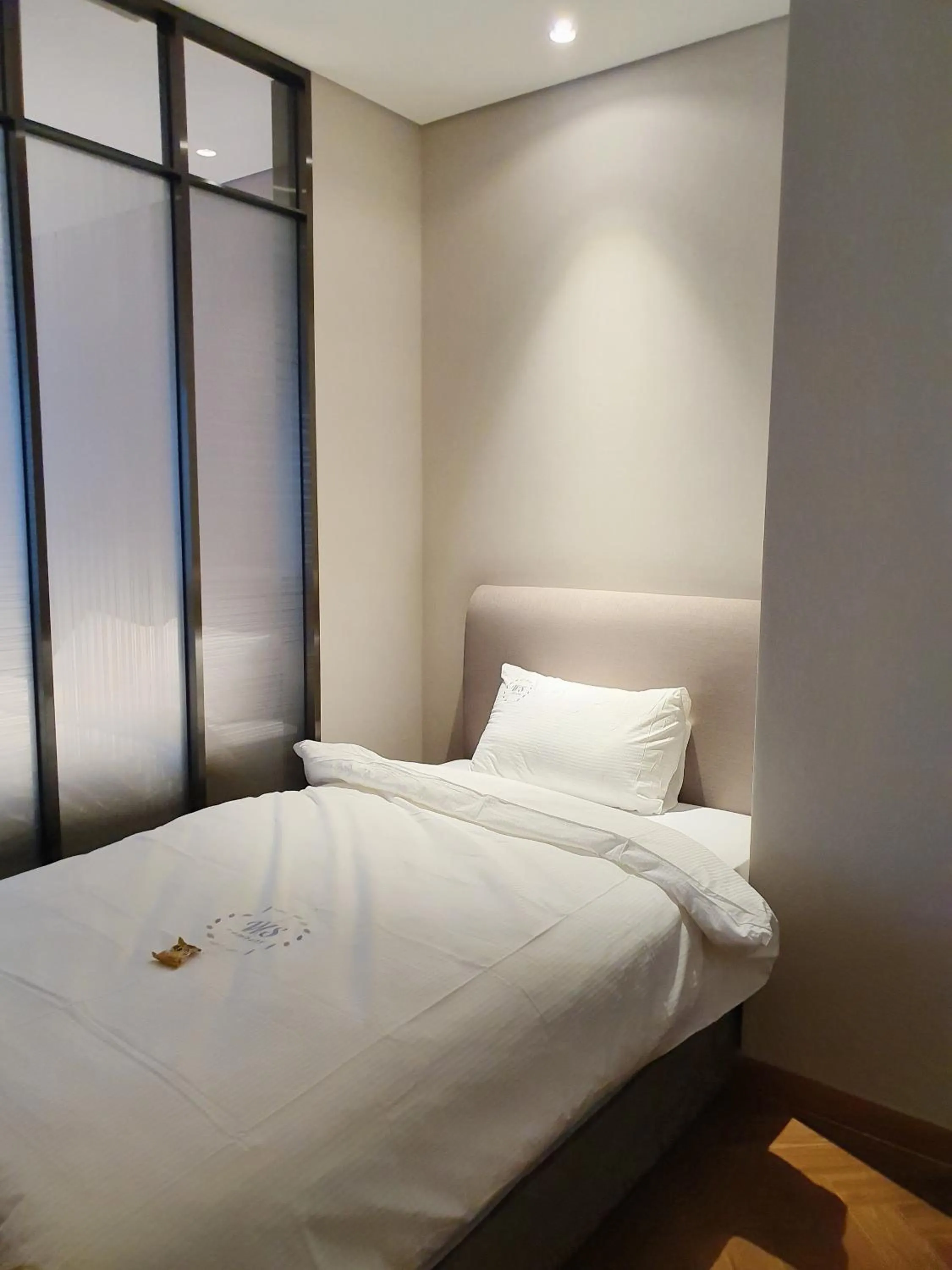 Bed in World State Hotel Sokcho