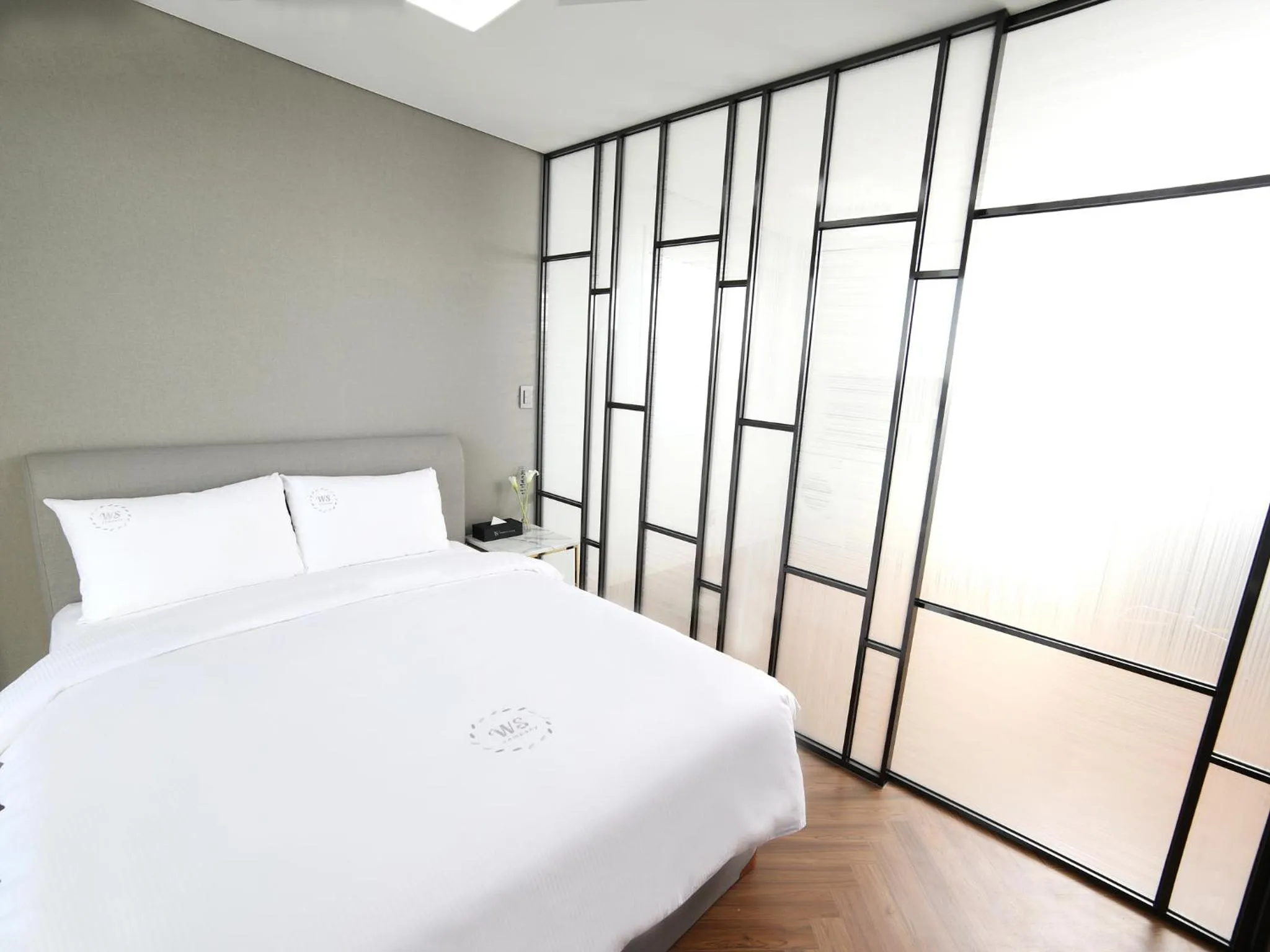 Bed in World State Hotel Sokcho
