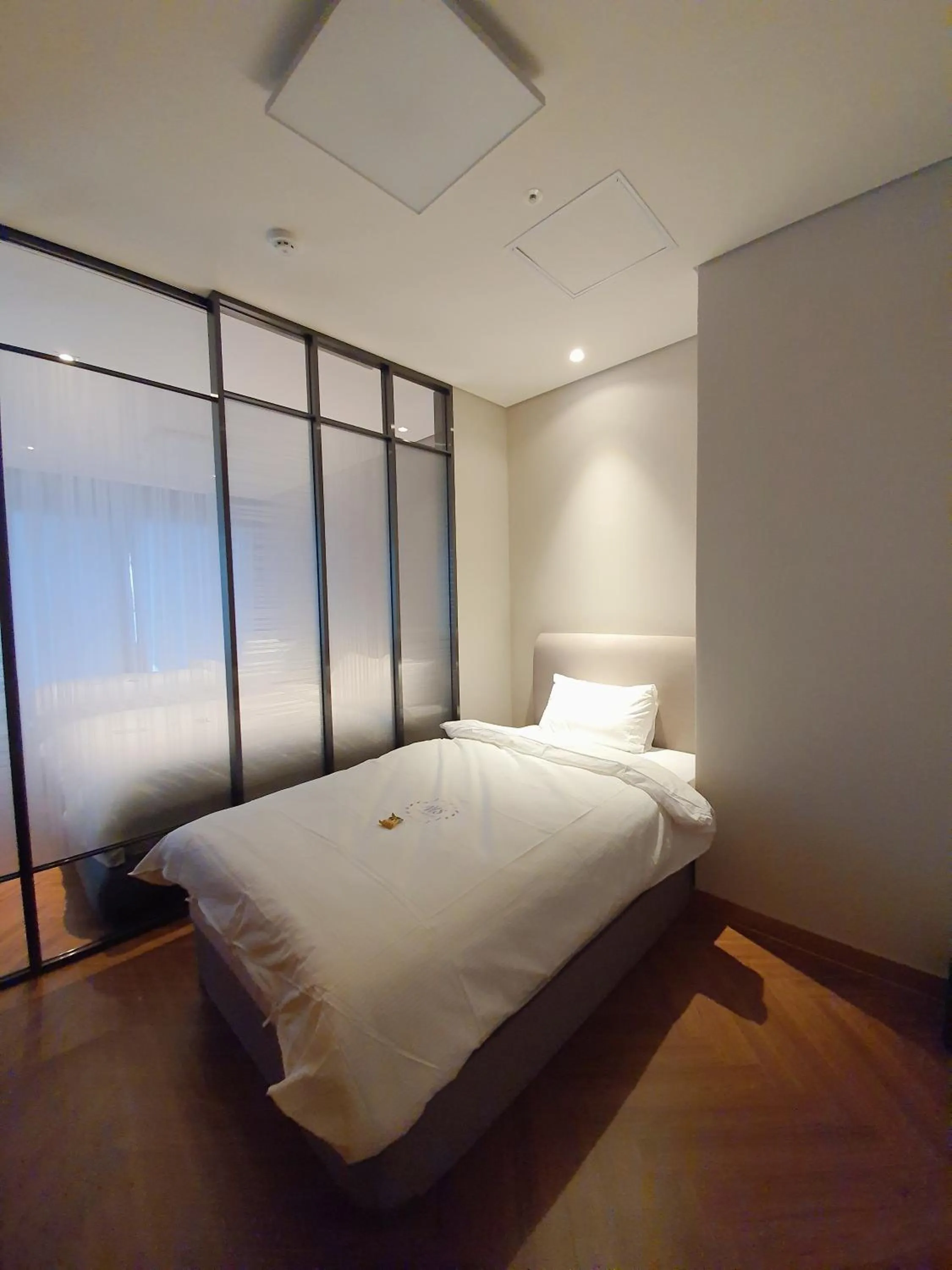 Bed in World State Hotel Sokcho