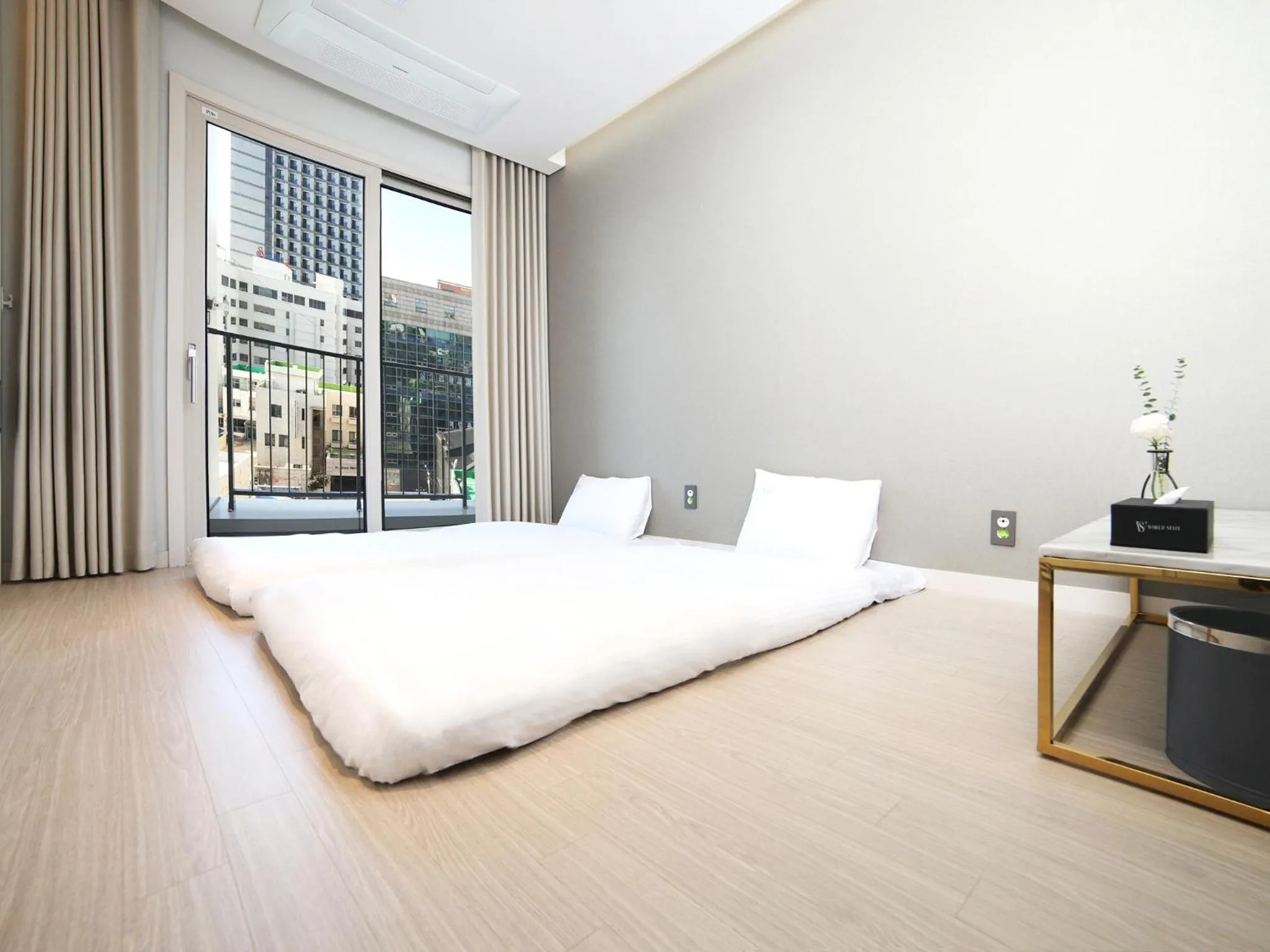 Bed in World State Hotel Sokcho