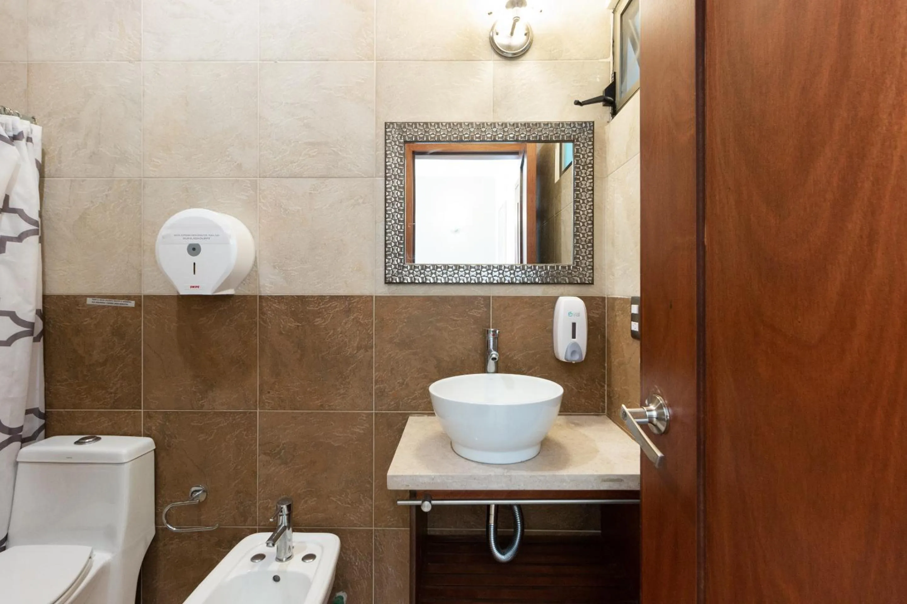 Bathroom in Capital O Hotel Vitale Leon MX