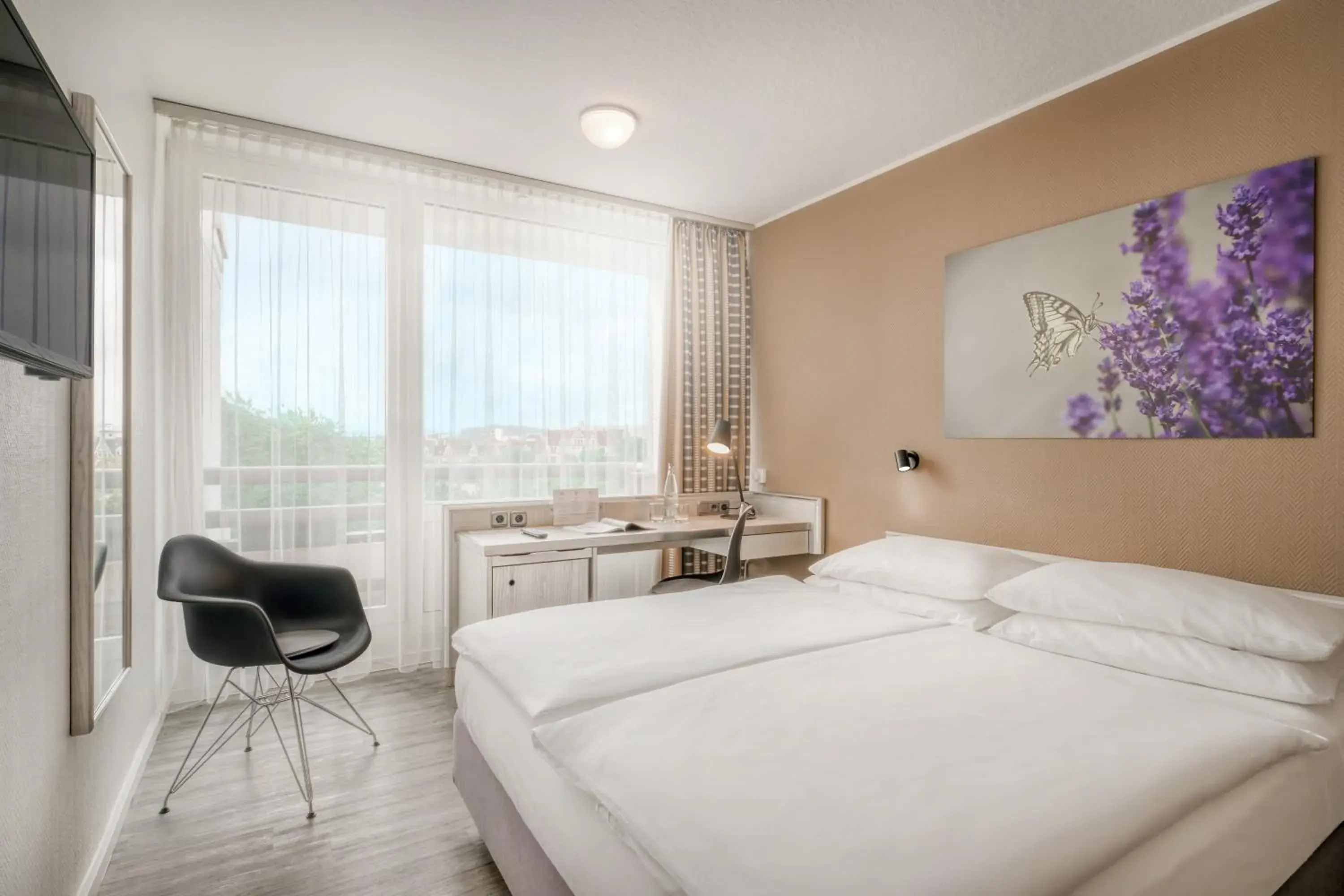 Bed in PARKHOTEL Hameln Bed in PARKHOTEL Hameln